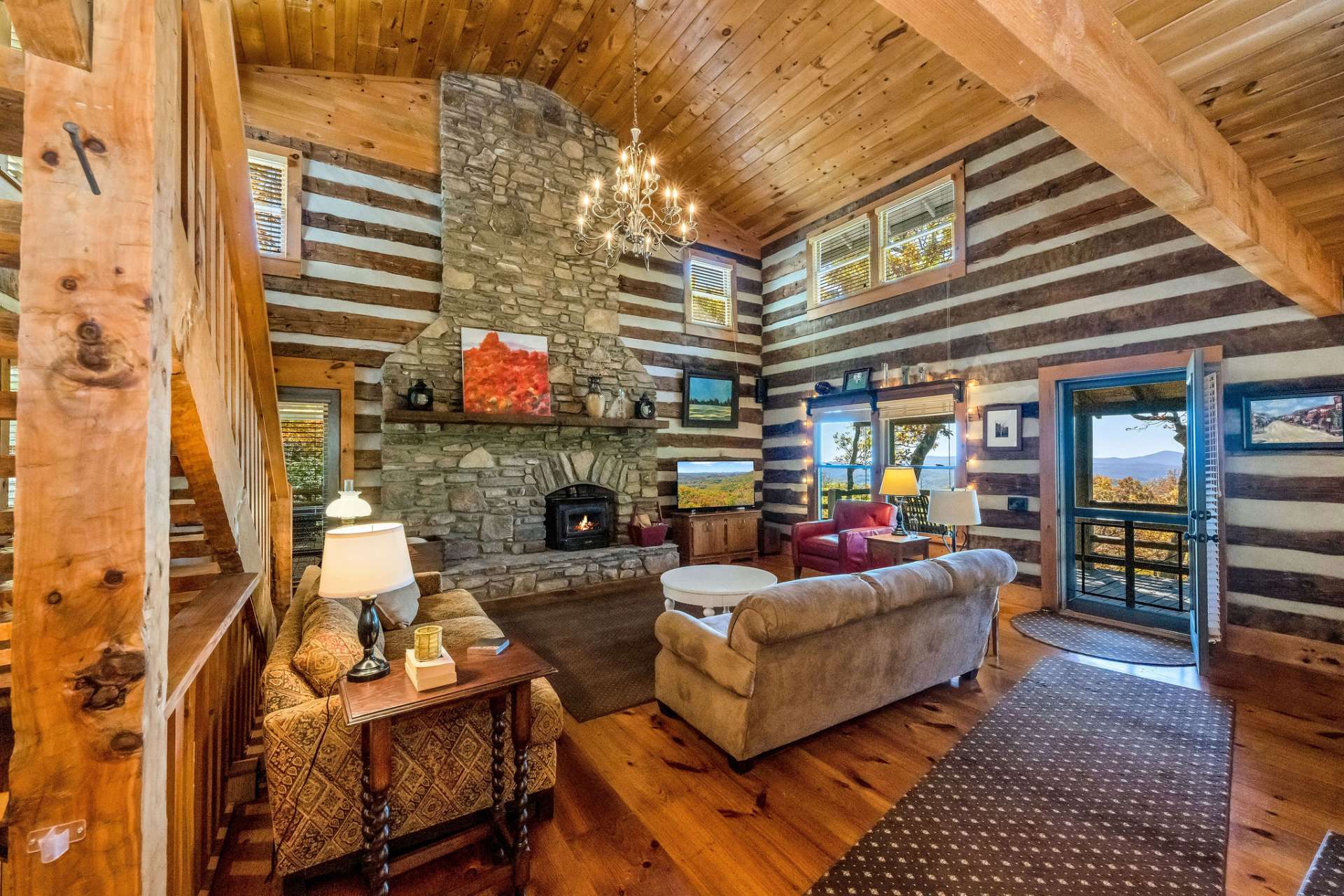 Step into the great room and marvel at the epic natural stone fireplace.