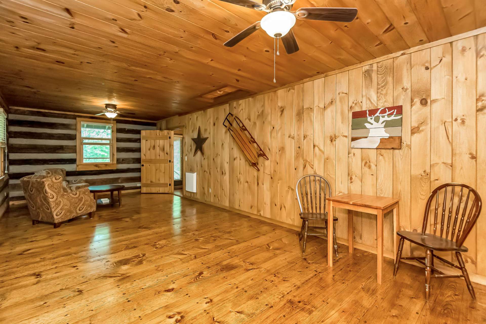 A large open sitting room provides space for your guests to relax and enjoy their private living quarters.