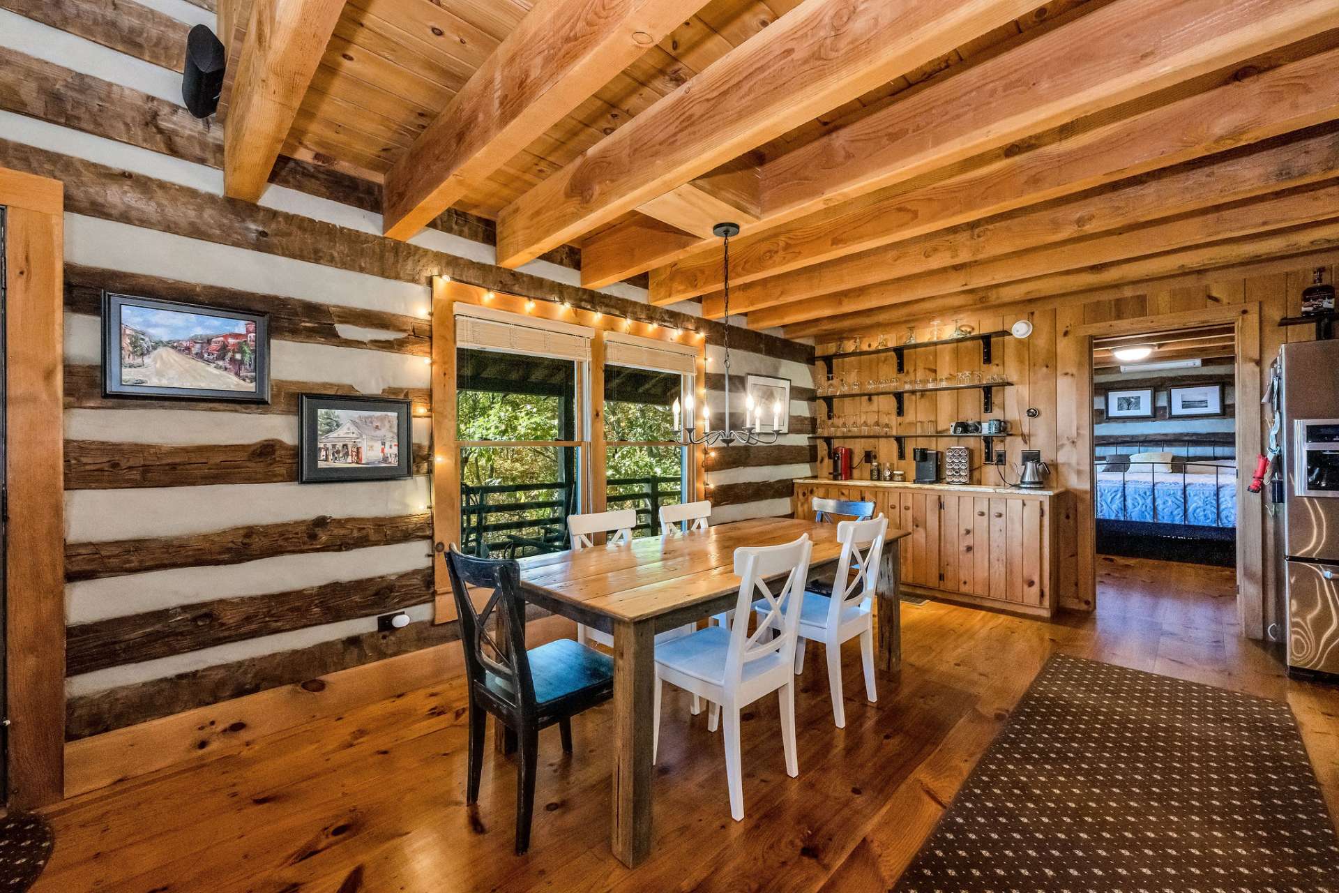 A multitude of windows beckon for your attention to the sea of Blue Ridge Mountains just beyond.