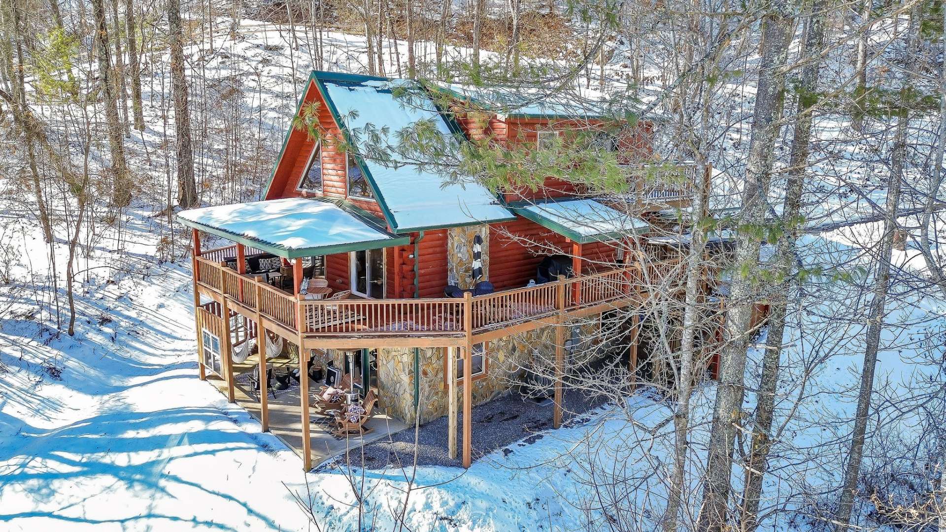 With an established short-term rental history, this property offers not only a luxurious mountain lifestyle but also an exceptional investment opportunity.