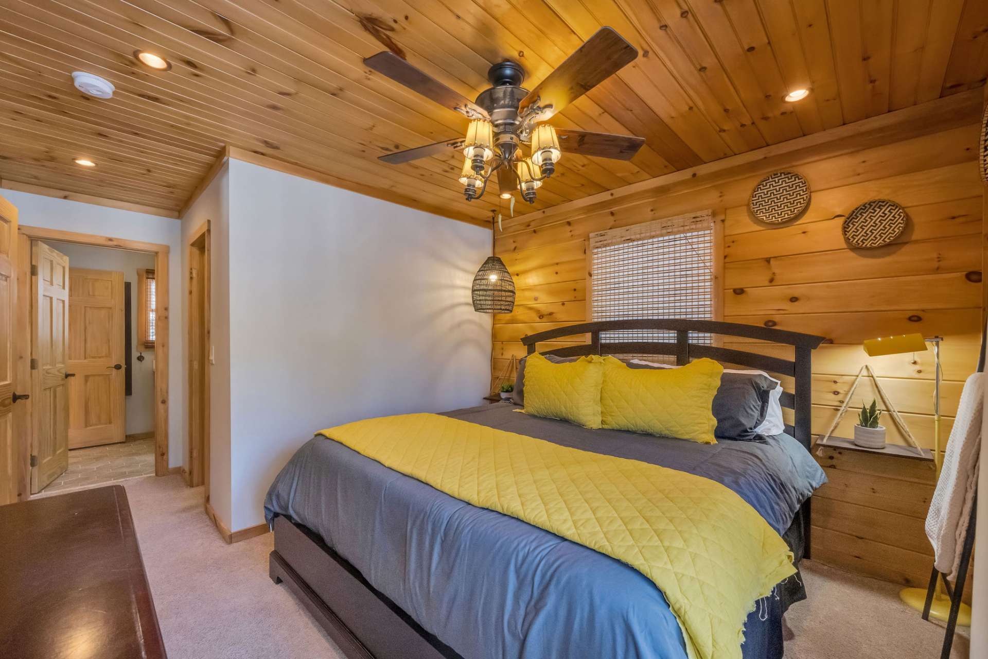 The first upper bedroom is spacious enough for a king bed and has a private sitting deck.