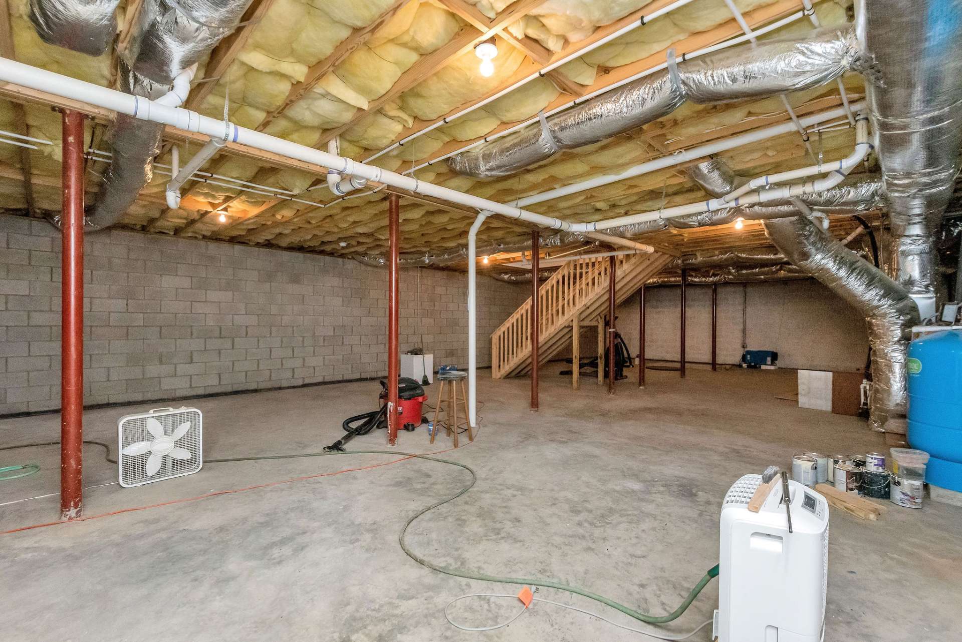 The full, unfinished basement includes a full unfinished bath, a commercial-grade dehumidifier, and a radon mitigation system, providing endless possibilities to expand and personalize.