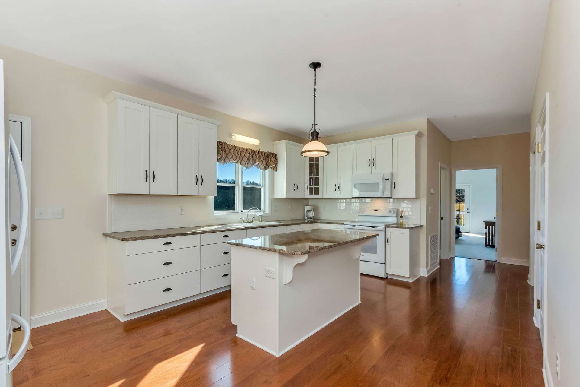 Great storage in the elegant white cabinets with the soft close feature.