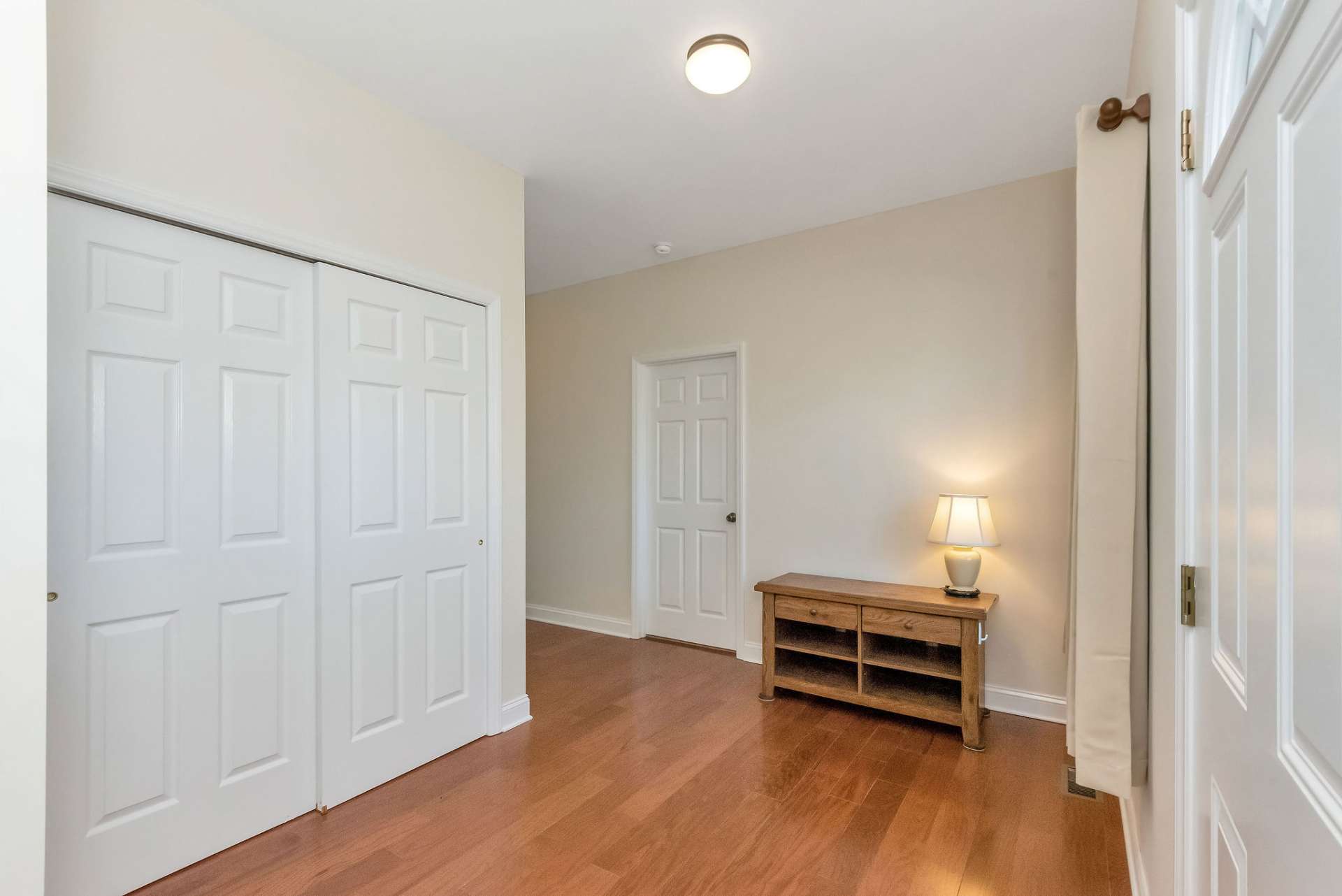 Step inside to a pleasant foyer with an oversized coat closet.