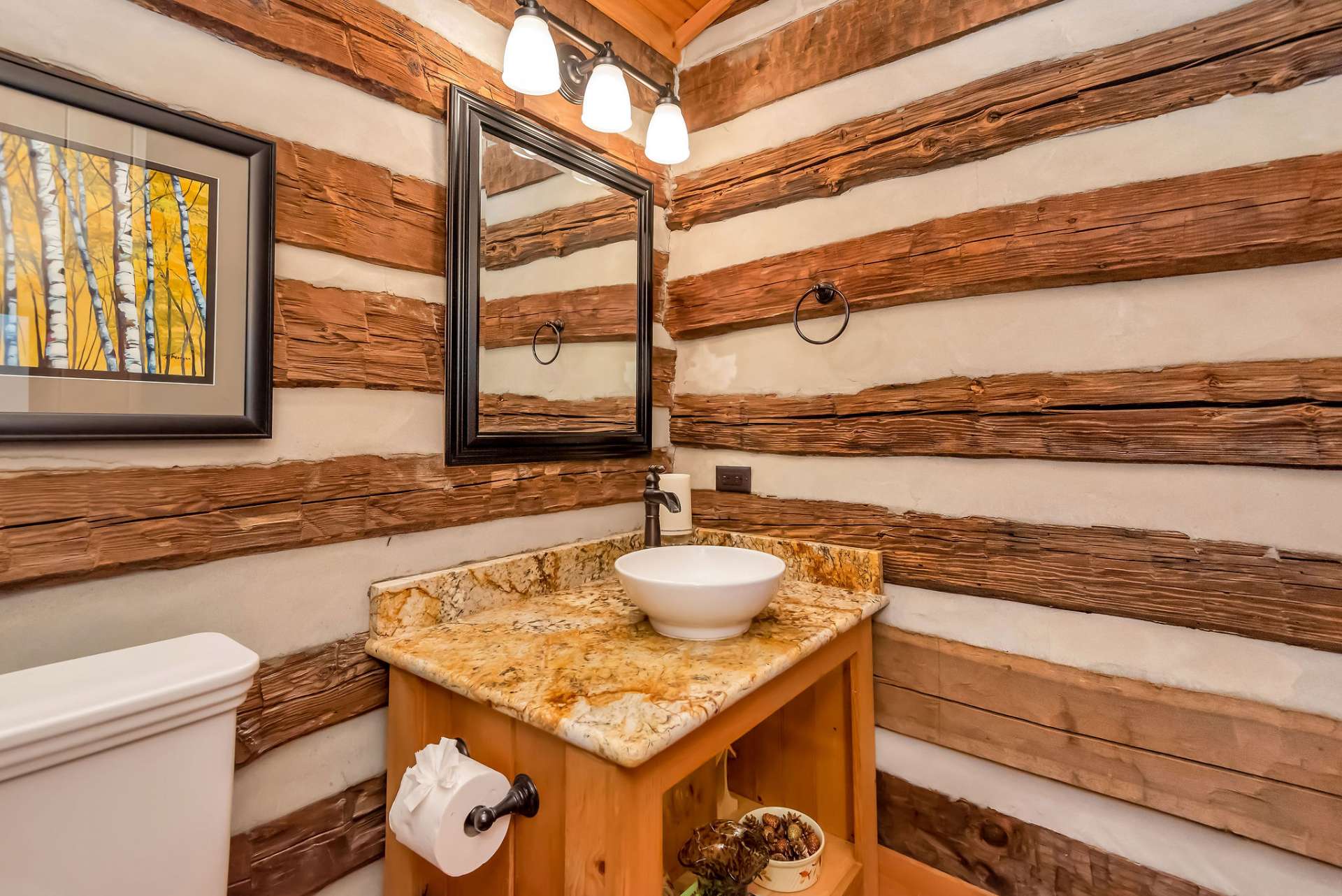 The half bath is conveniently located in the entryway.