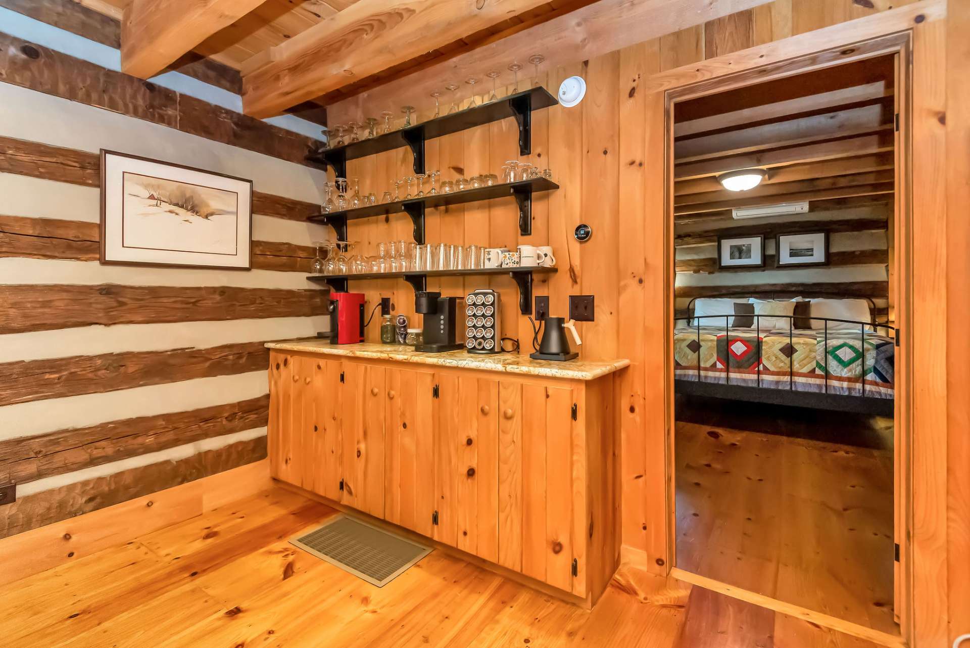 The functional beverage bar is a unique feature and allows under-counter storage for kitchen and dining accessories.