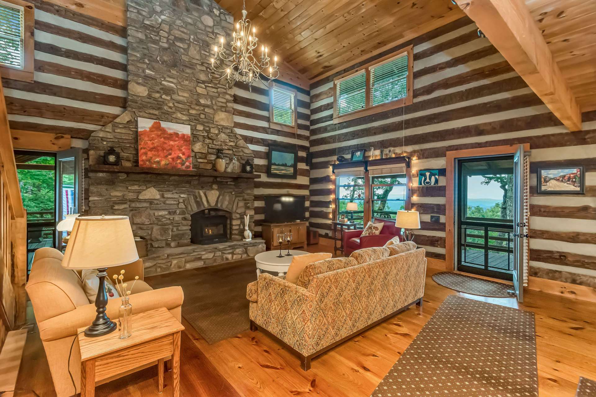 Step into the great room and marvel at the epic natural stone fireplace.