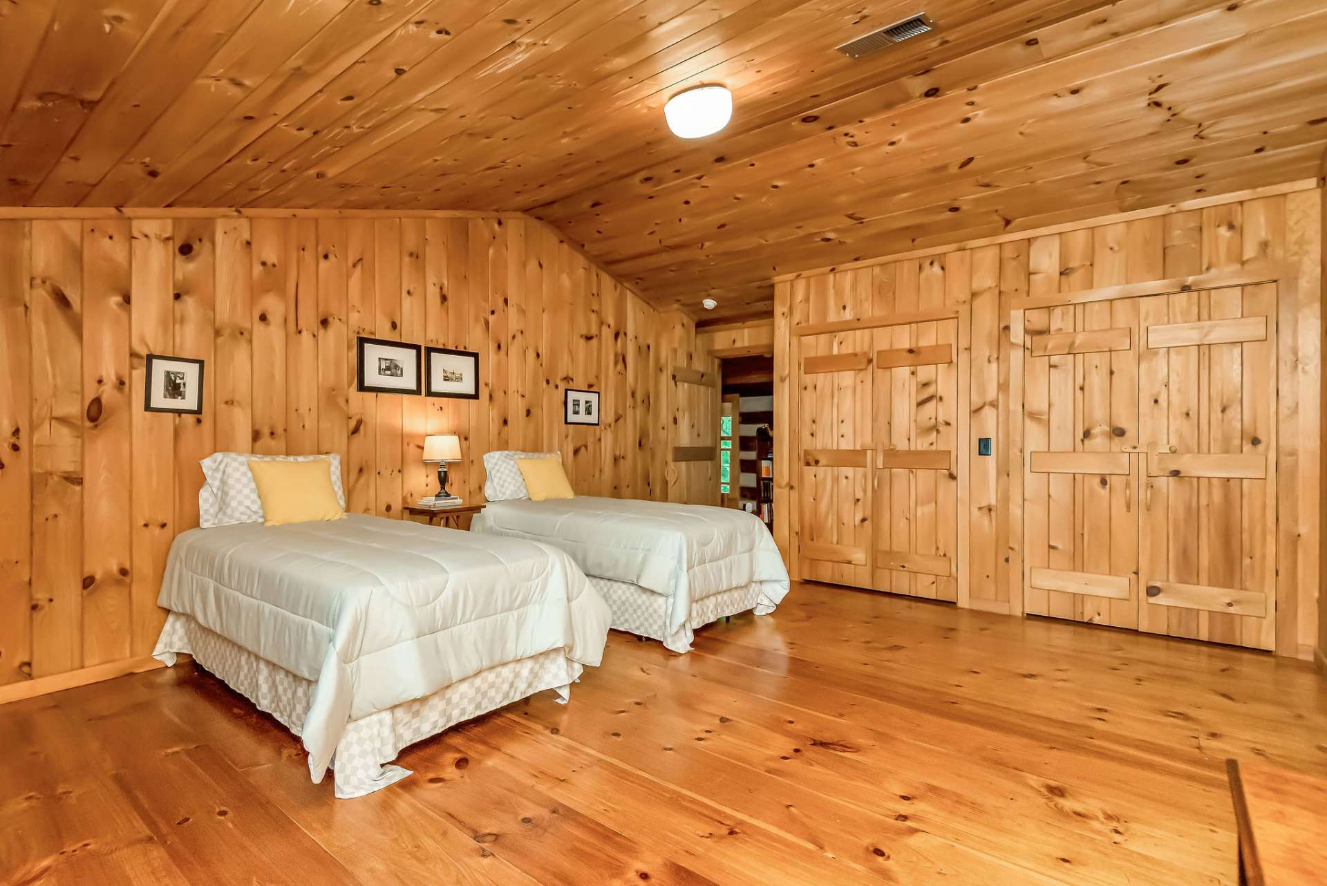 Your guests will enjoy space to stretch out and relax in this spacious bedroom.