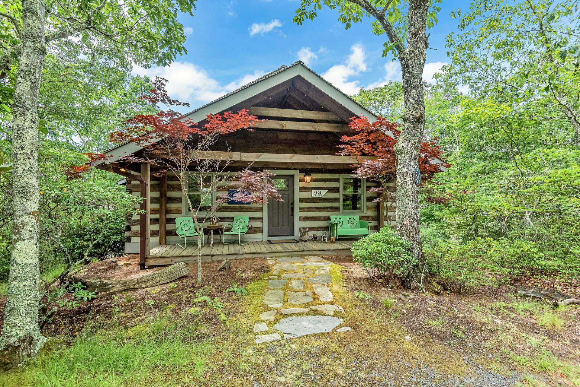 The detached garage features the "Love Shack" on the upper level.