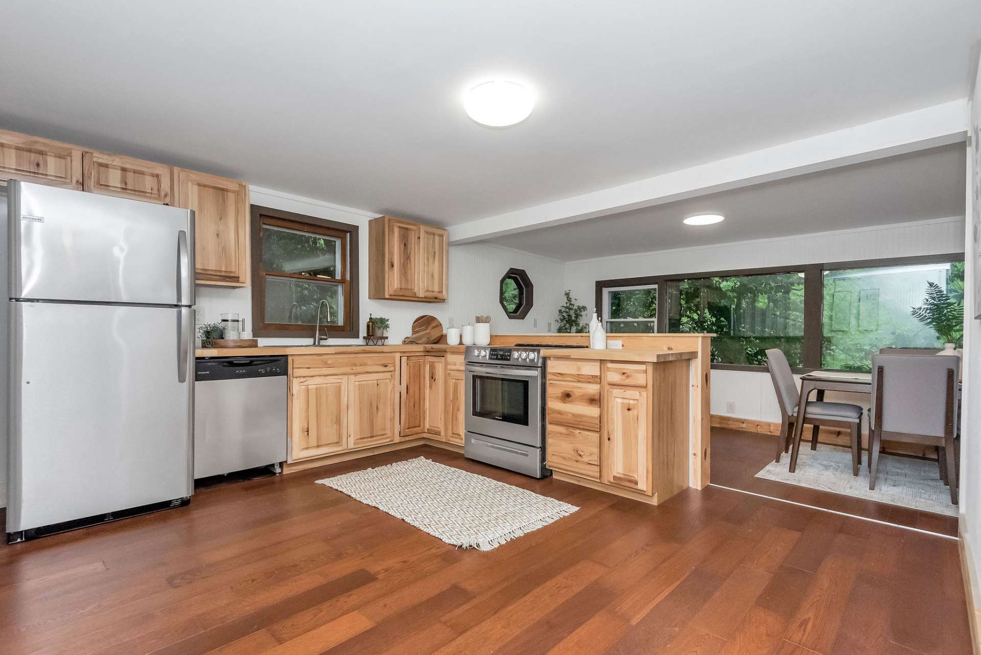 Spacious kitchen with hickory cabinets