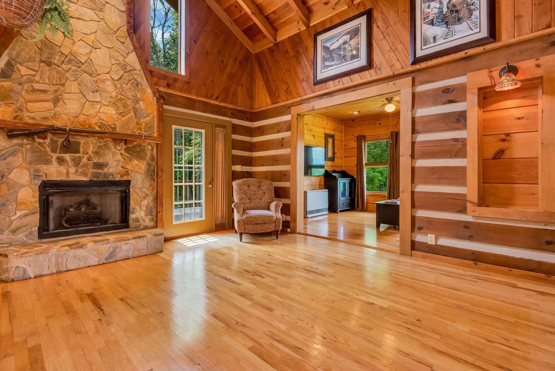 Imagine spending cool winter evenings snuggled up by the fire in front of this beautiful 2-story stone fireplace.