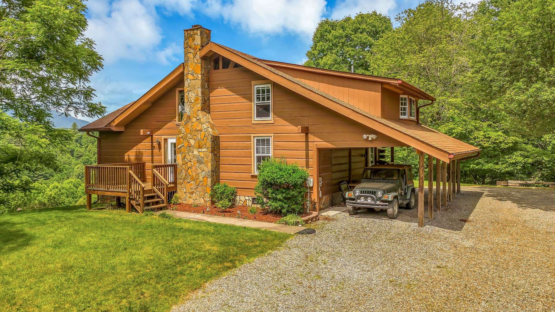 A cozy side porch provides access to the living room, offering a welcoming entrance for your guests.