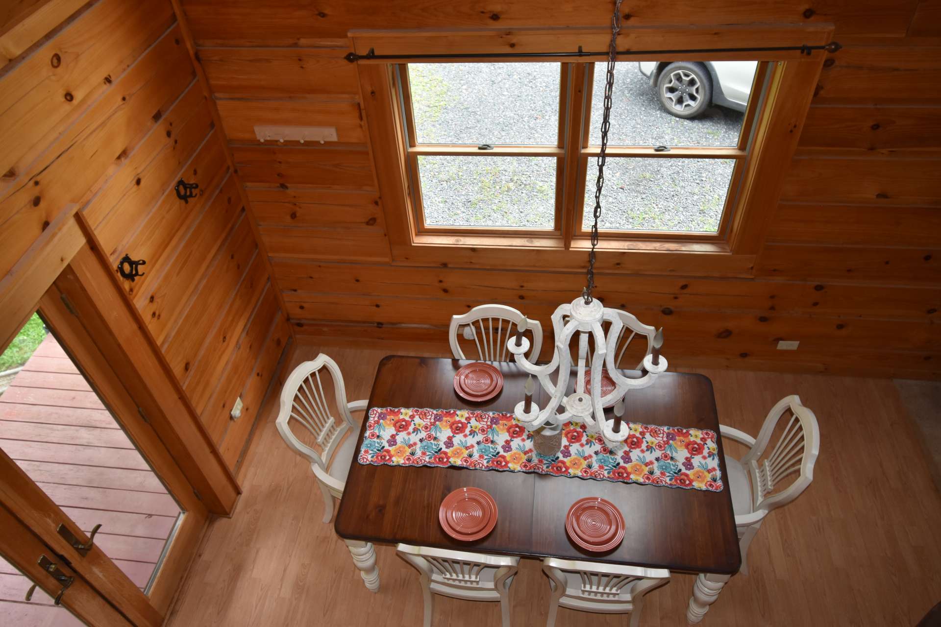 A glance down from the loft into the dining room