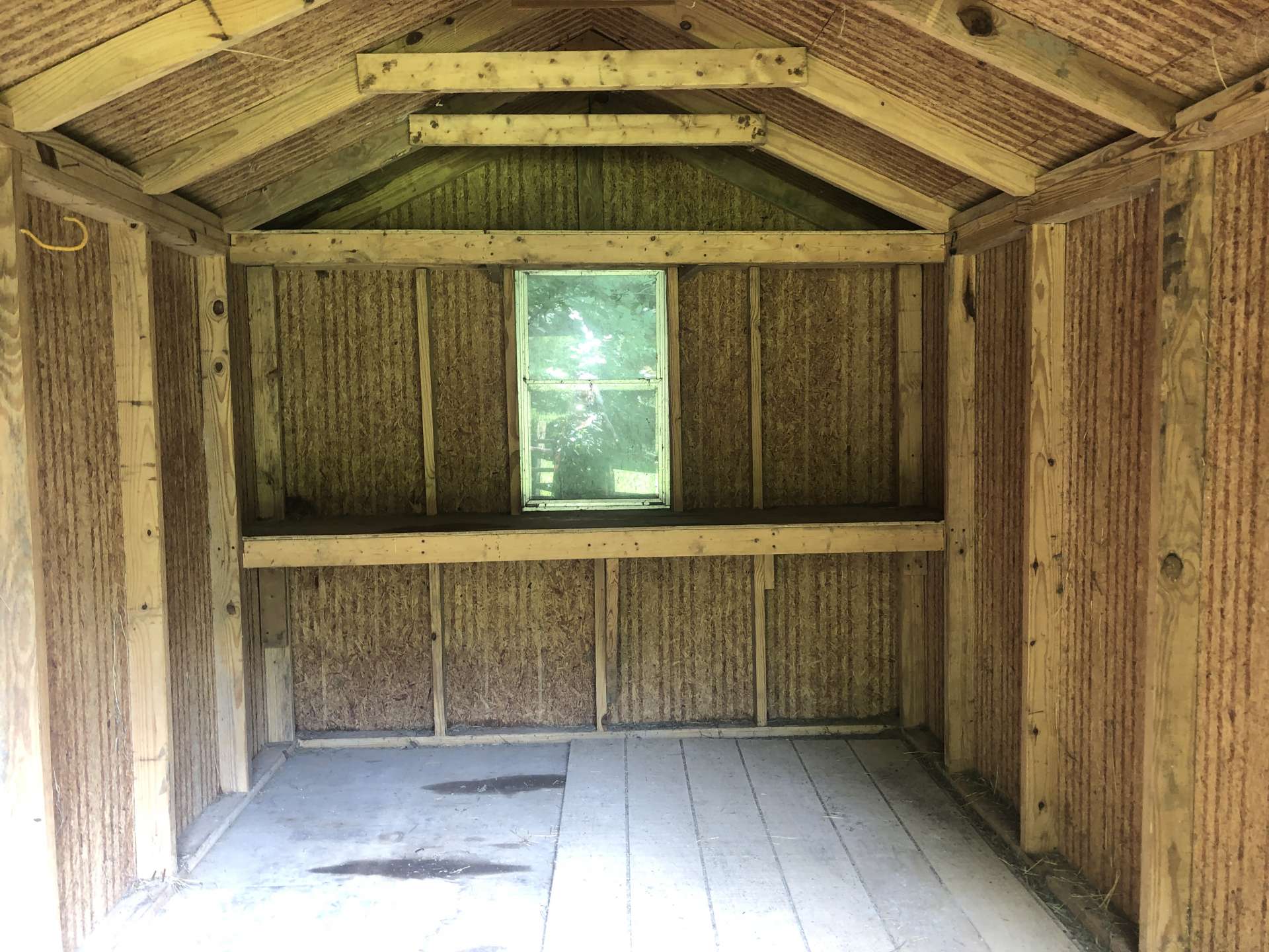 Inside the white storage building