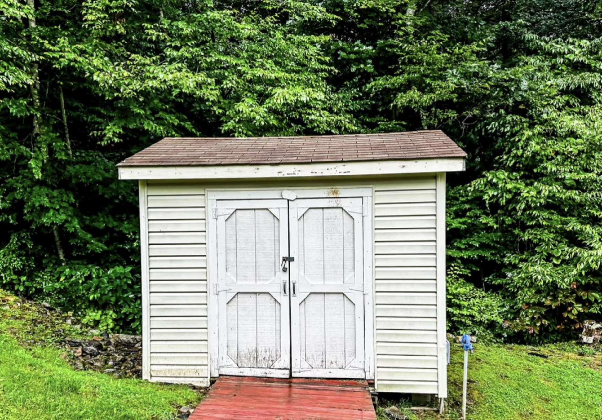 Additional storage building for lawn equipment or chemicals