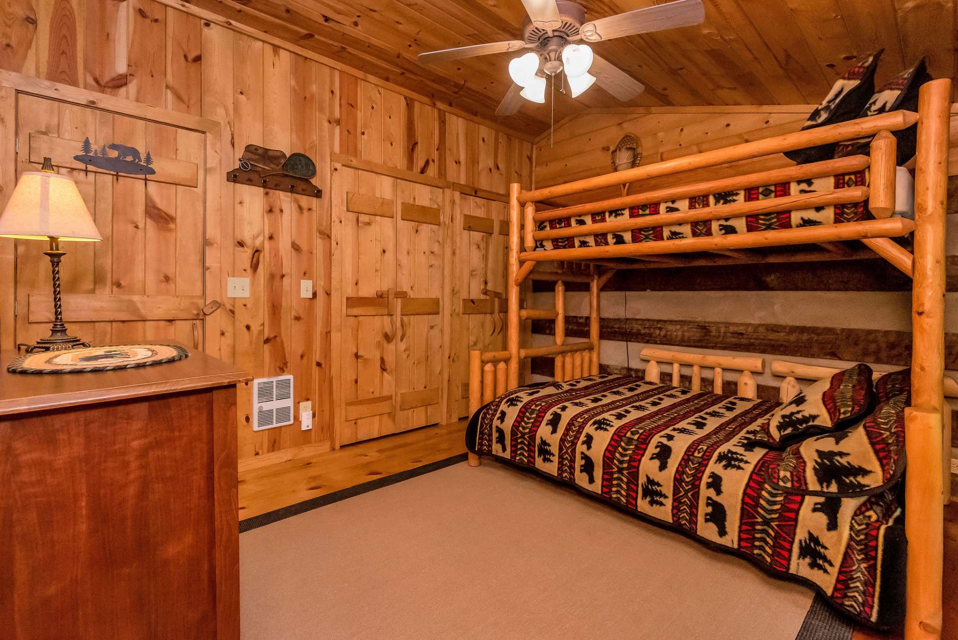 This loft bedroom can accommodate longer stays with a sizable closet and space to unwind.