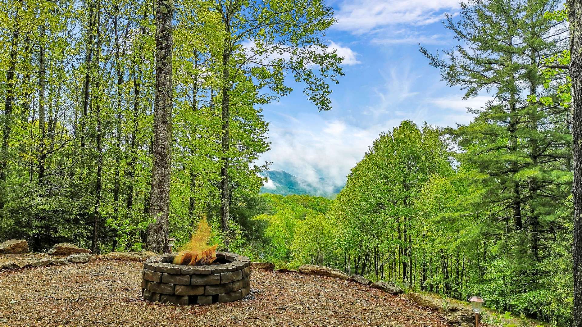 Enjoy an evening by the fire pit with the incredible mountain views.