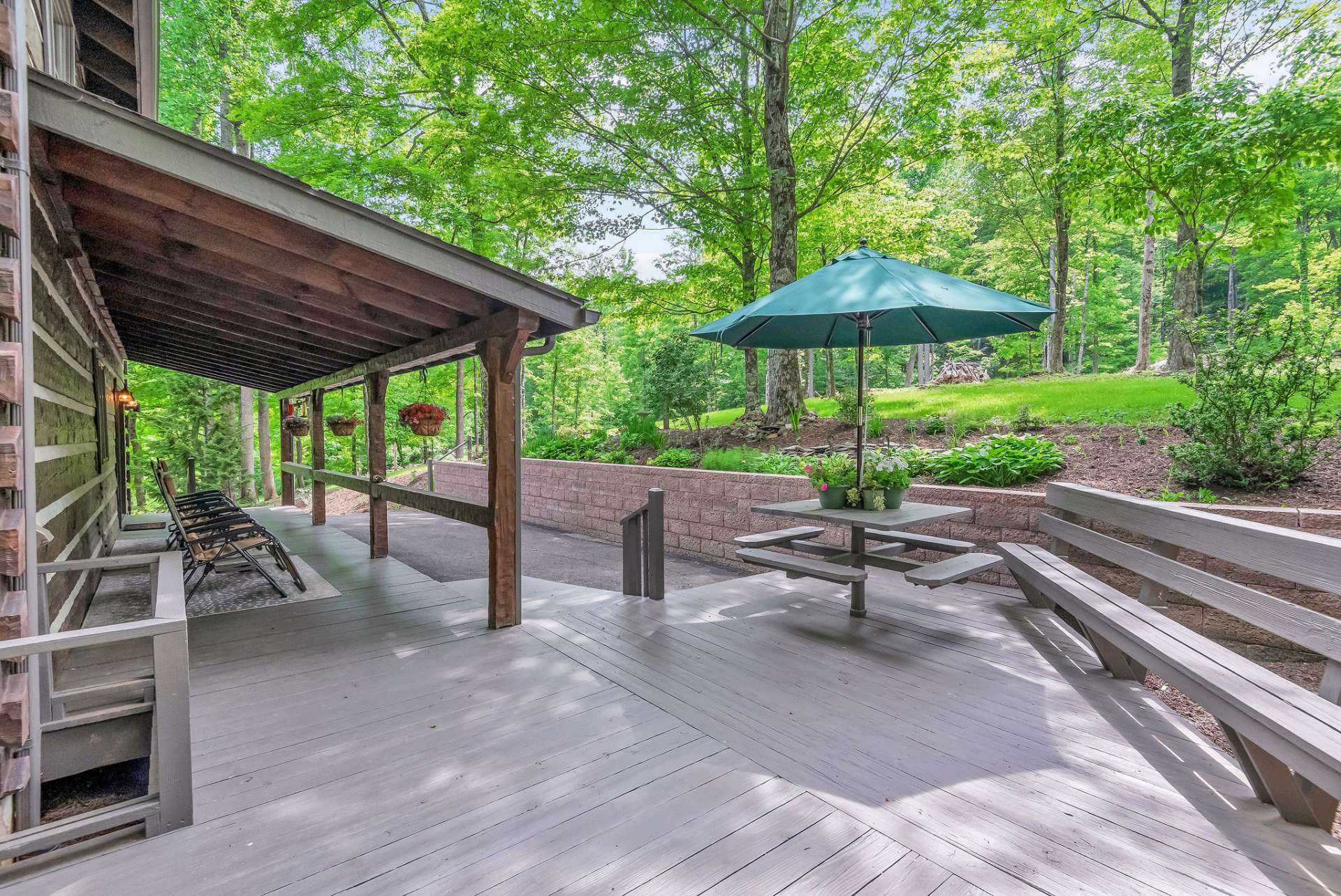 Whether you're grilling up burgers for a summer barbecue or simply soaking up the sunshine, this deck provides the ideal setting for making memories that last a lifetime.