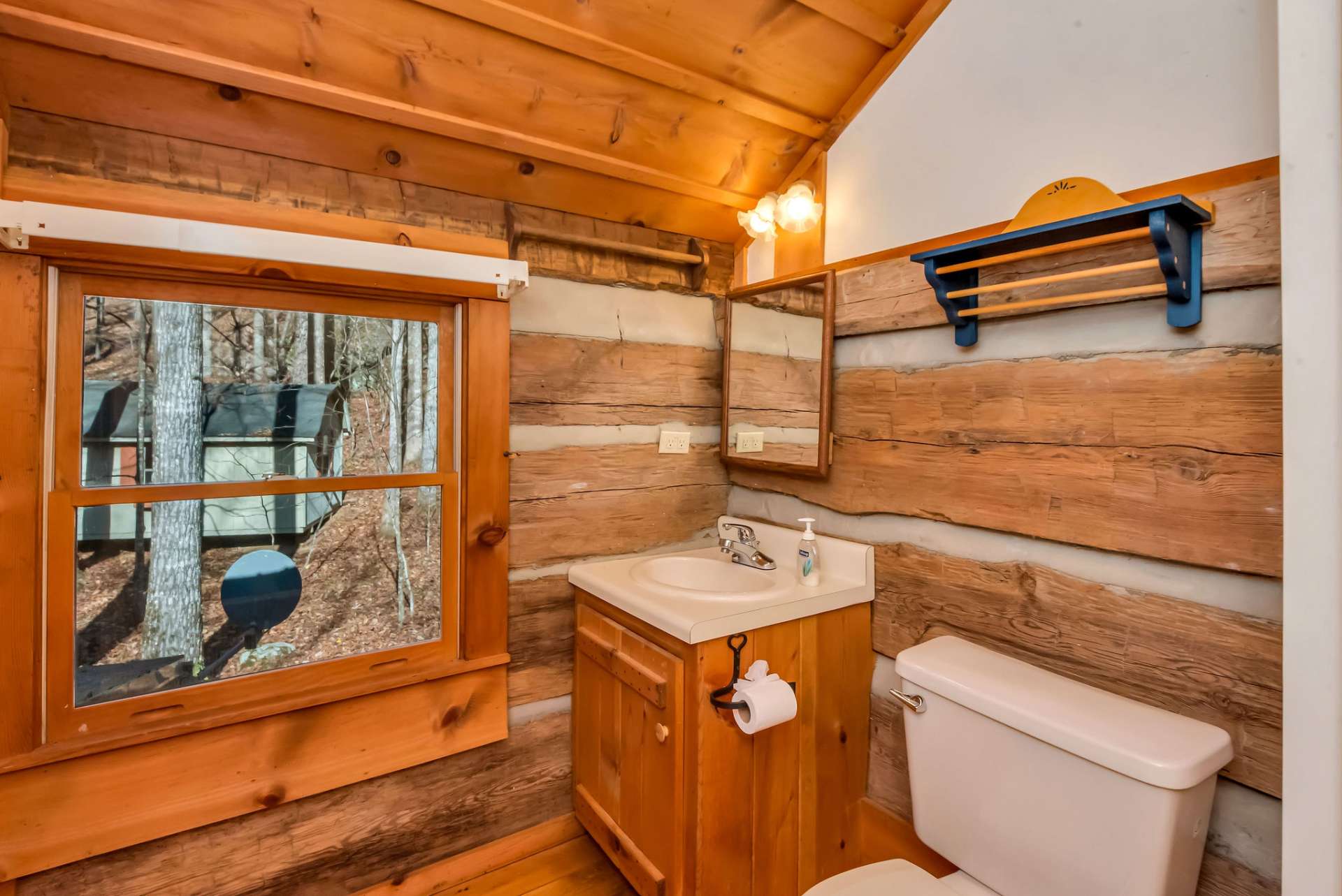 The upper-level full bath provides everything your guests need for a comfortable stay.