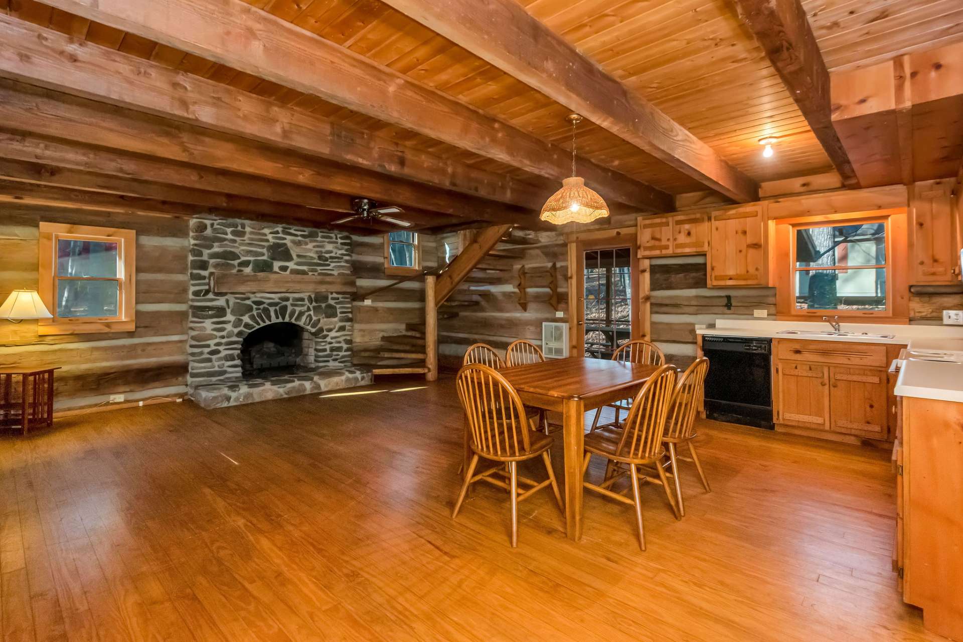 Experience the timeless beauty of a log cabin, where handcrafted logs and warm wood tones evoke a sense of history and tradition.