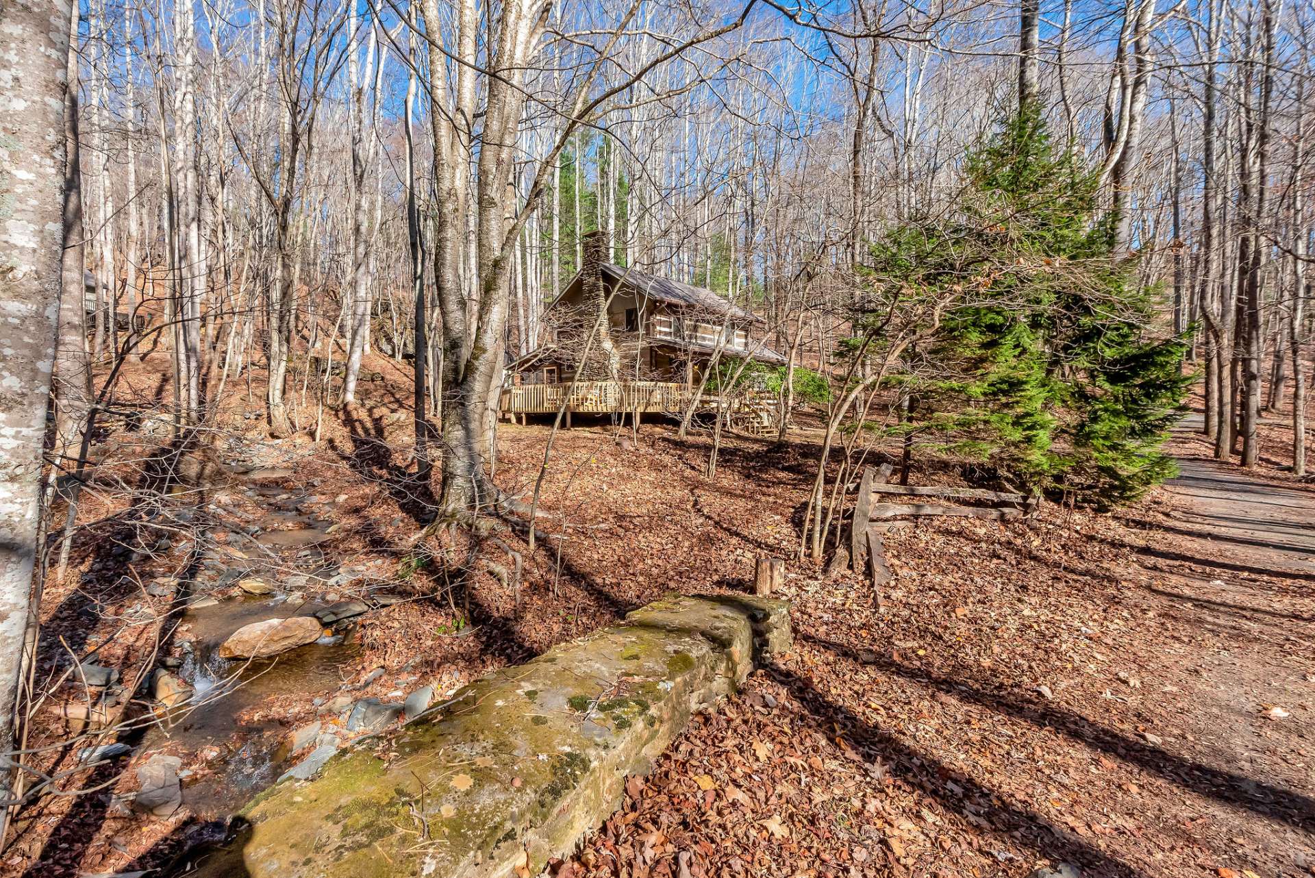 Stroll across one of the unique stone bridges that inspired the name of this picturesque community.