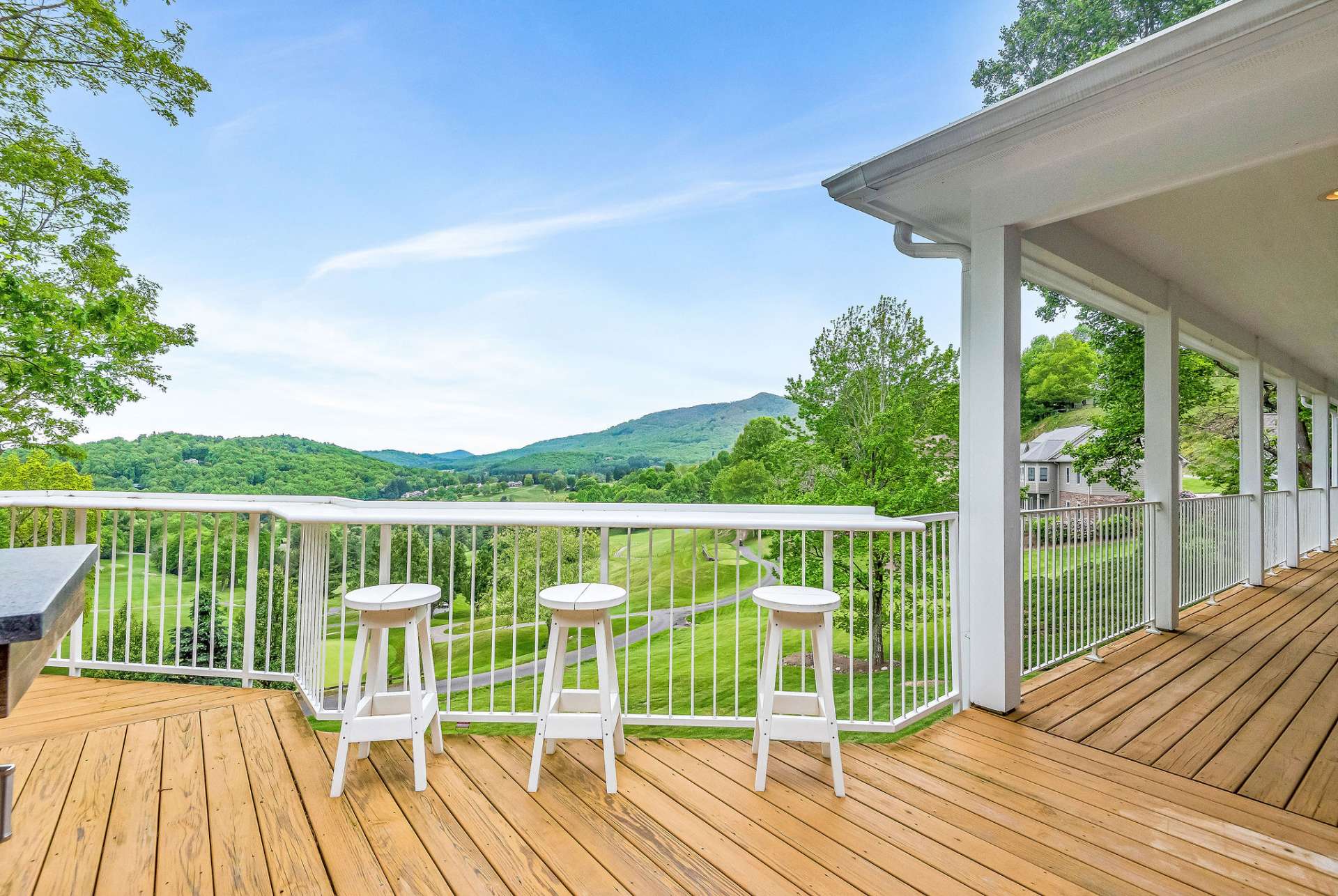 Picture yourself standing on the deck of your dream home nestled within the picturesque landscape of Mountain Aire Golf Course. As you gaze outwards, Fairway #5 unfolds beneath your eyes, a verdant ribbon winding its way through the meticulously manicured greenery.
