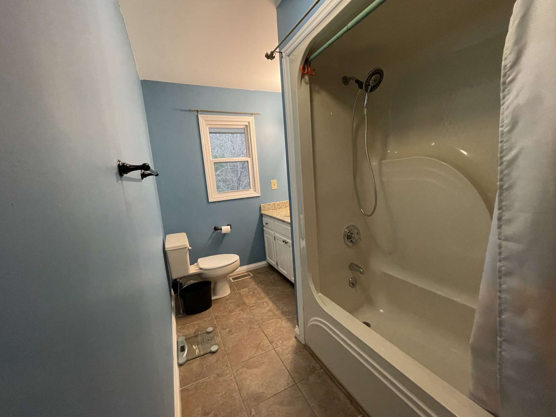 The second full bath on the main level also has a washer/dryer connection.