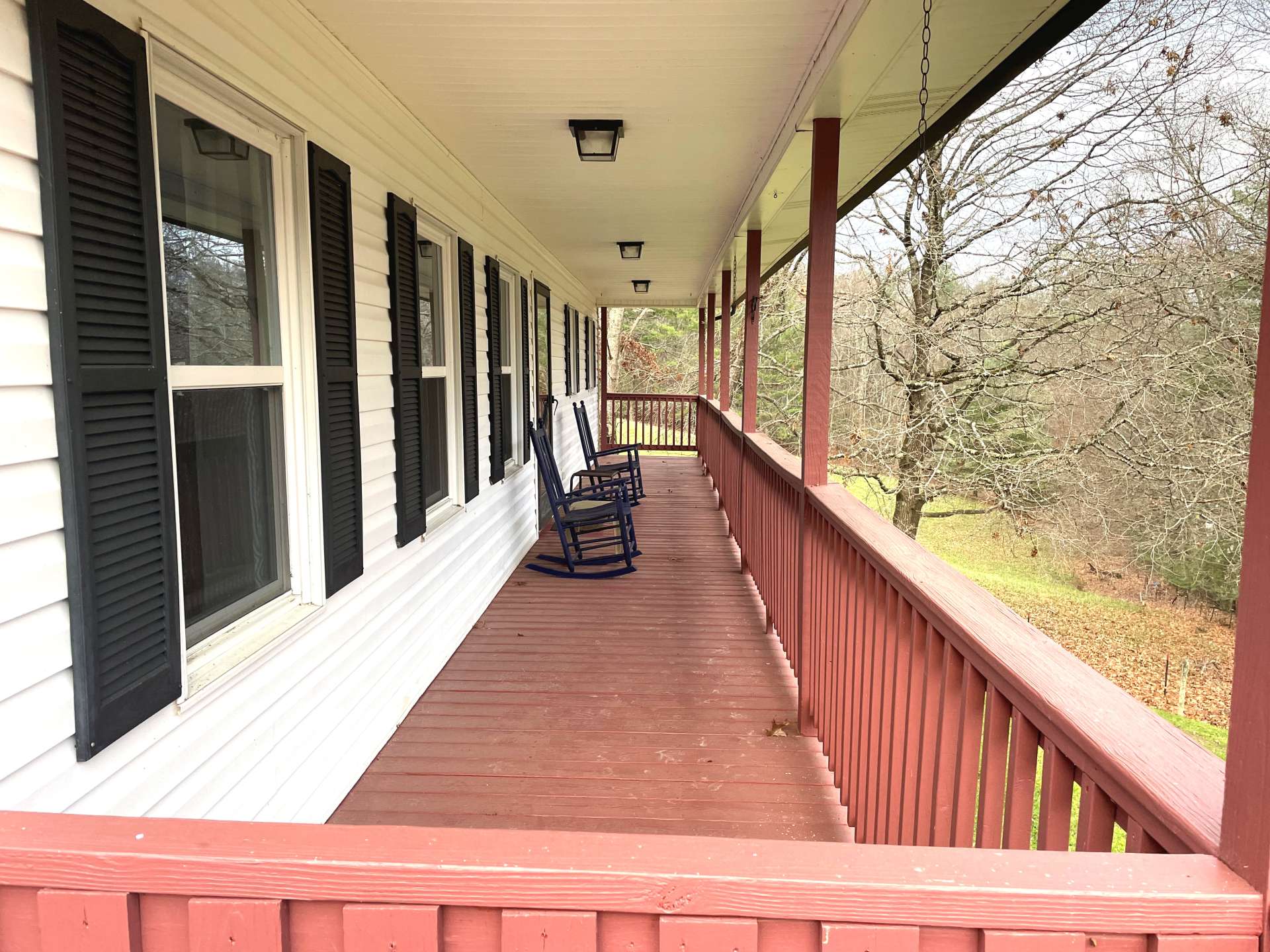 Enjoy the peaceful setting on the covered front porch.