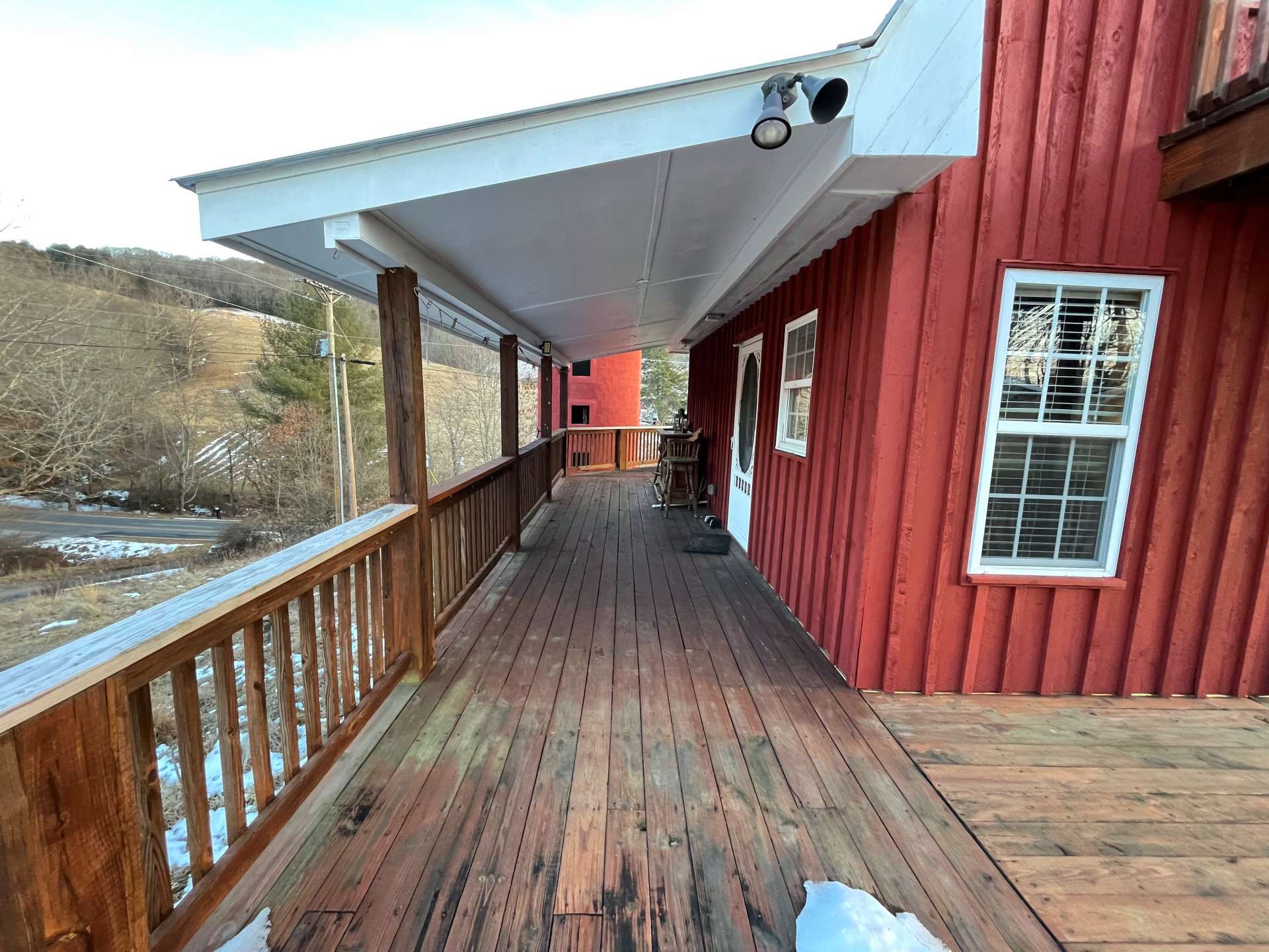 Featuring both covered and uncovered decks around the entire house on the main level.