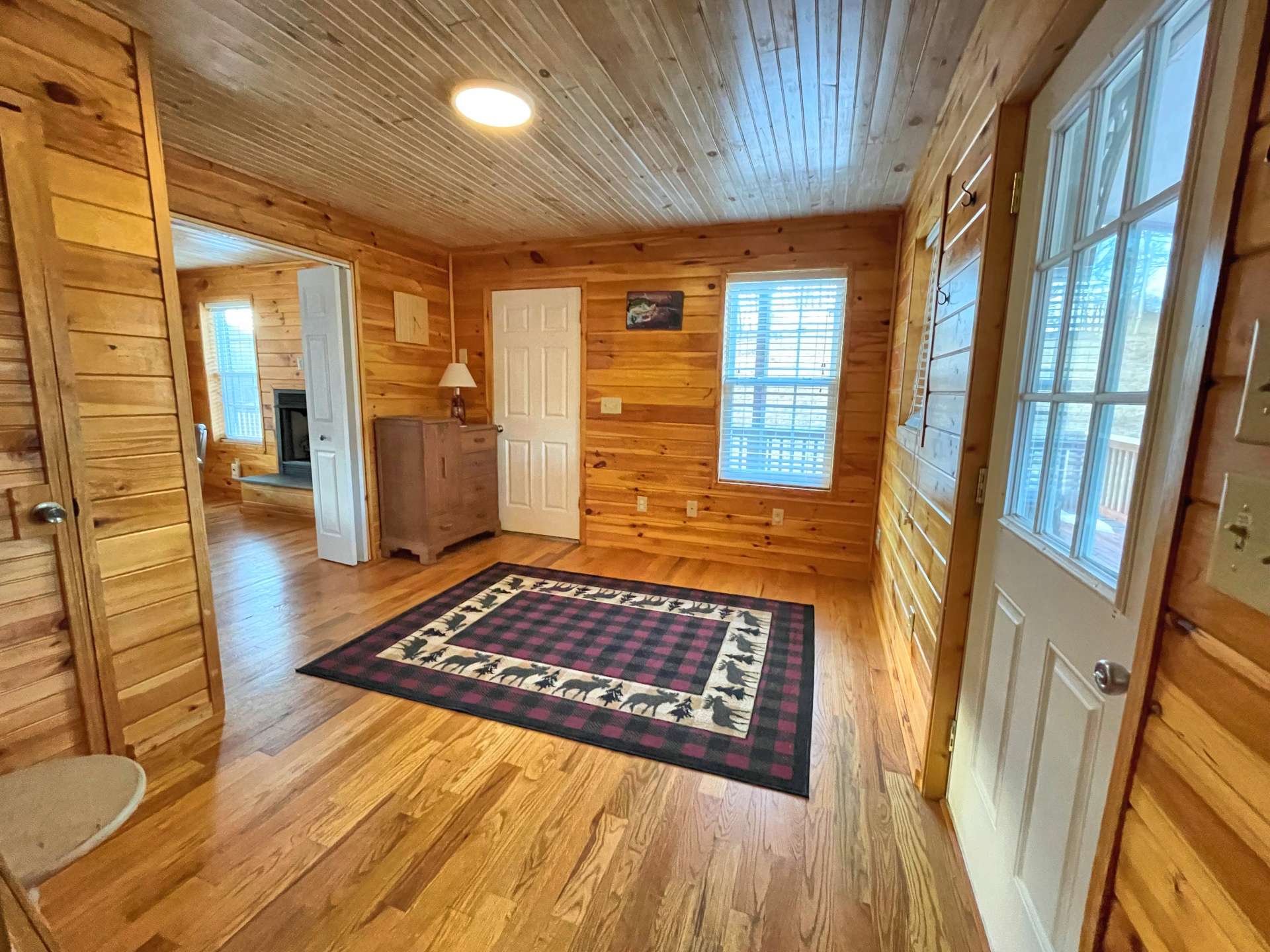 The bonus room on the main level features folding doors from the family room so that it can be used as a bedroom.