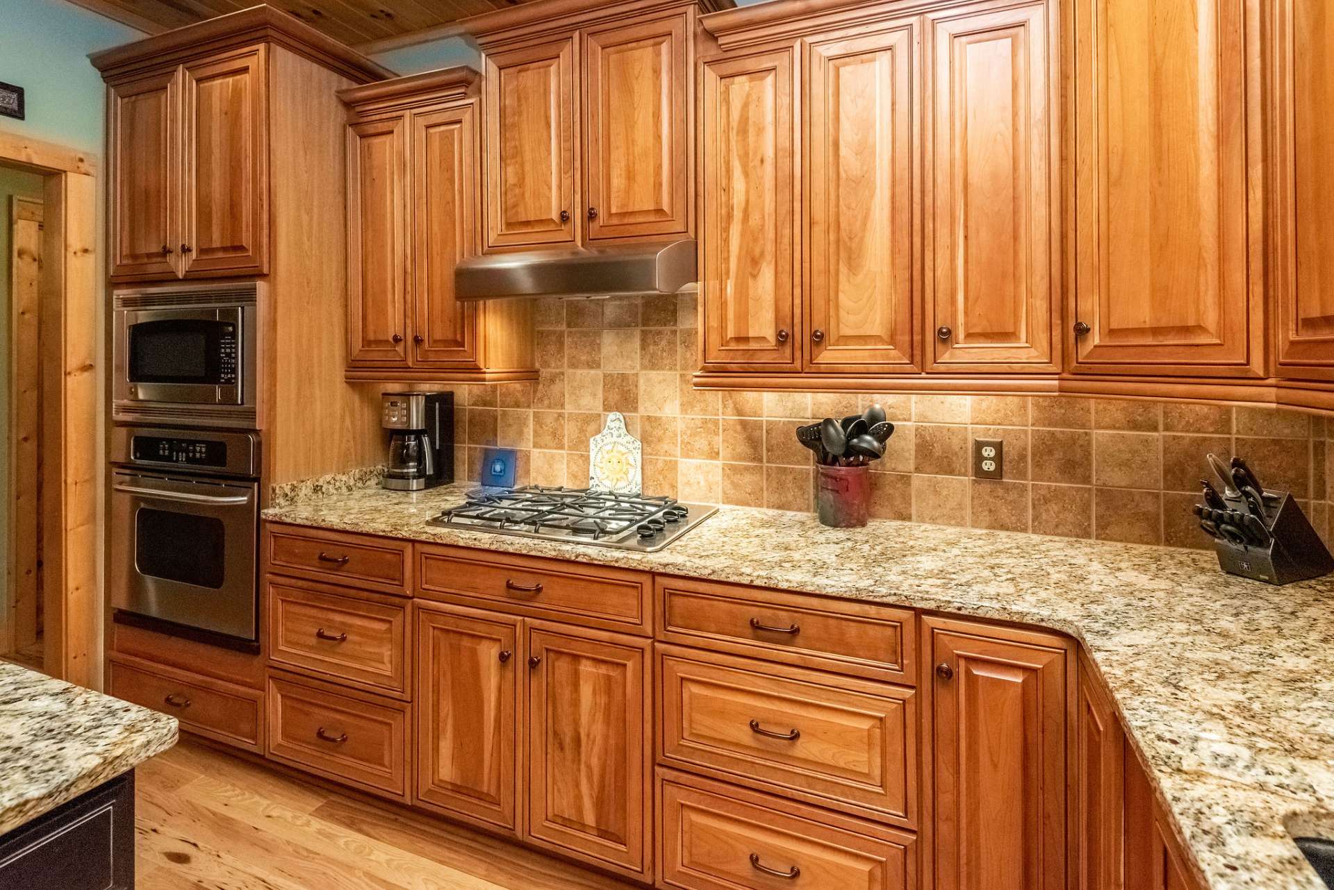 Abundant counter space with beautiful granite counter tops.