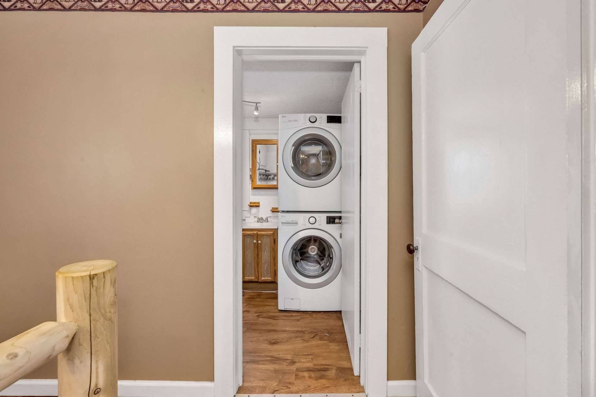 The bath/laundry combo is just off the primary bedroom.