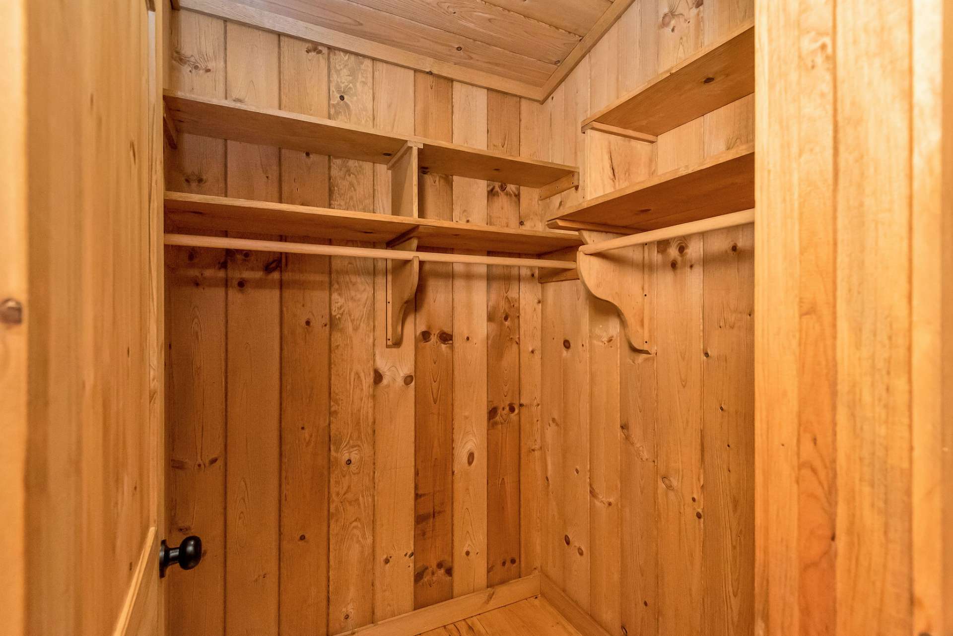A walk-in closet provides ample storage space, ensuring organization and convenience.