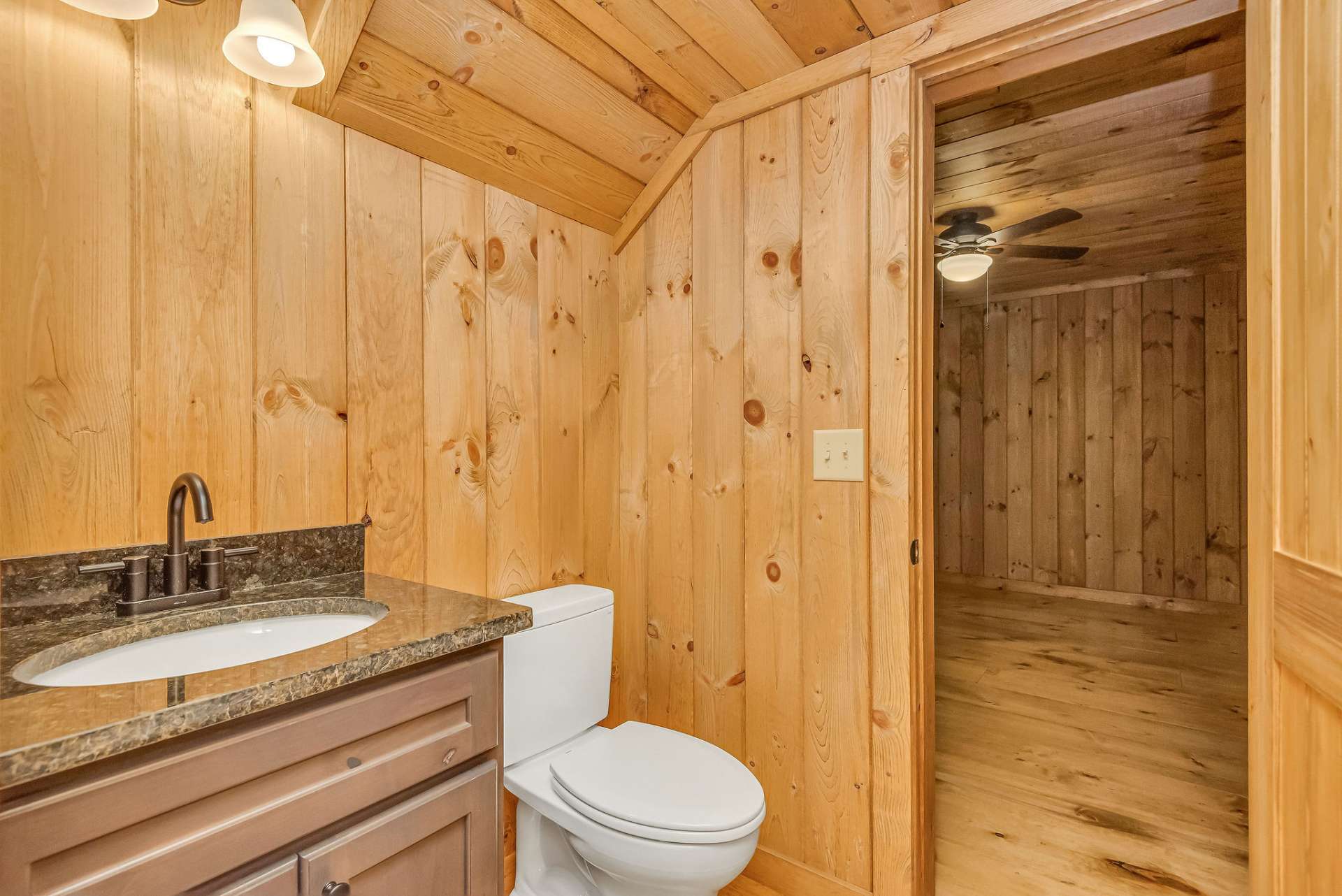 A full bath is conveniently located between the family room and bedroom.