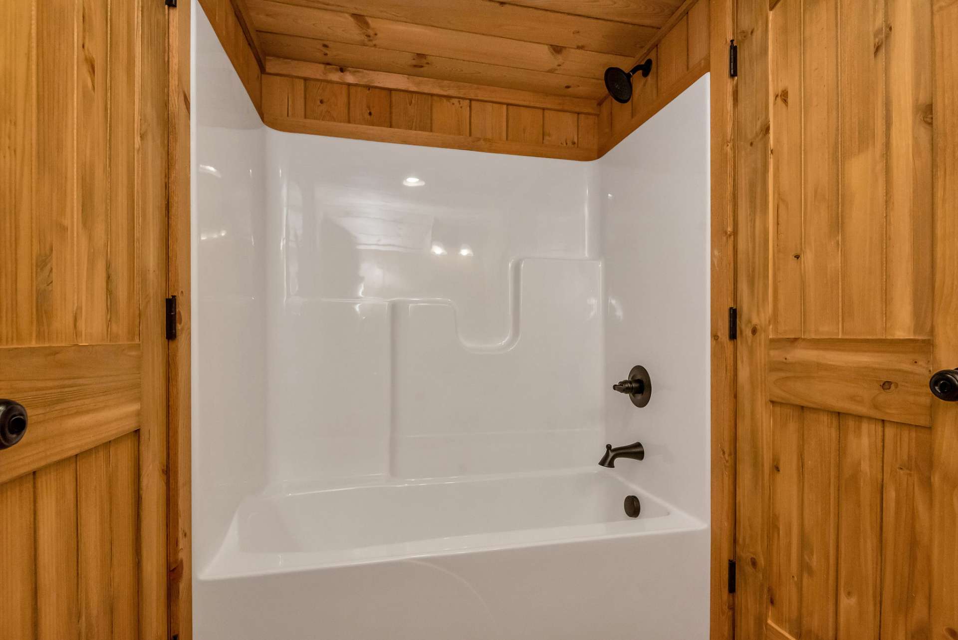 Fiberglass tub/shower combination for comfort and functionality.
