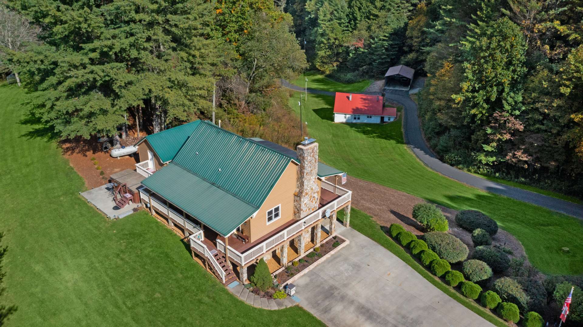 Aerial view of home and guest cottage