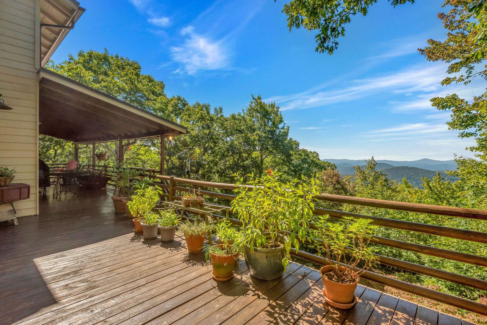 A wall of windows floods the space with natural light, showcasing stunning views and seamlessly blending the indoors with the beauty of the outdoors. The cabin has central A/C but Pella windows open out should you opt to enjoy a cool mountain breeze....