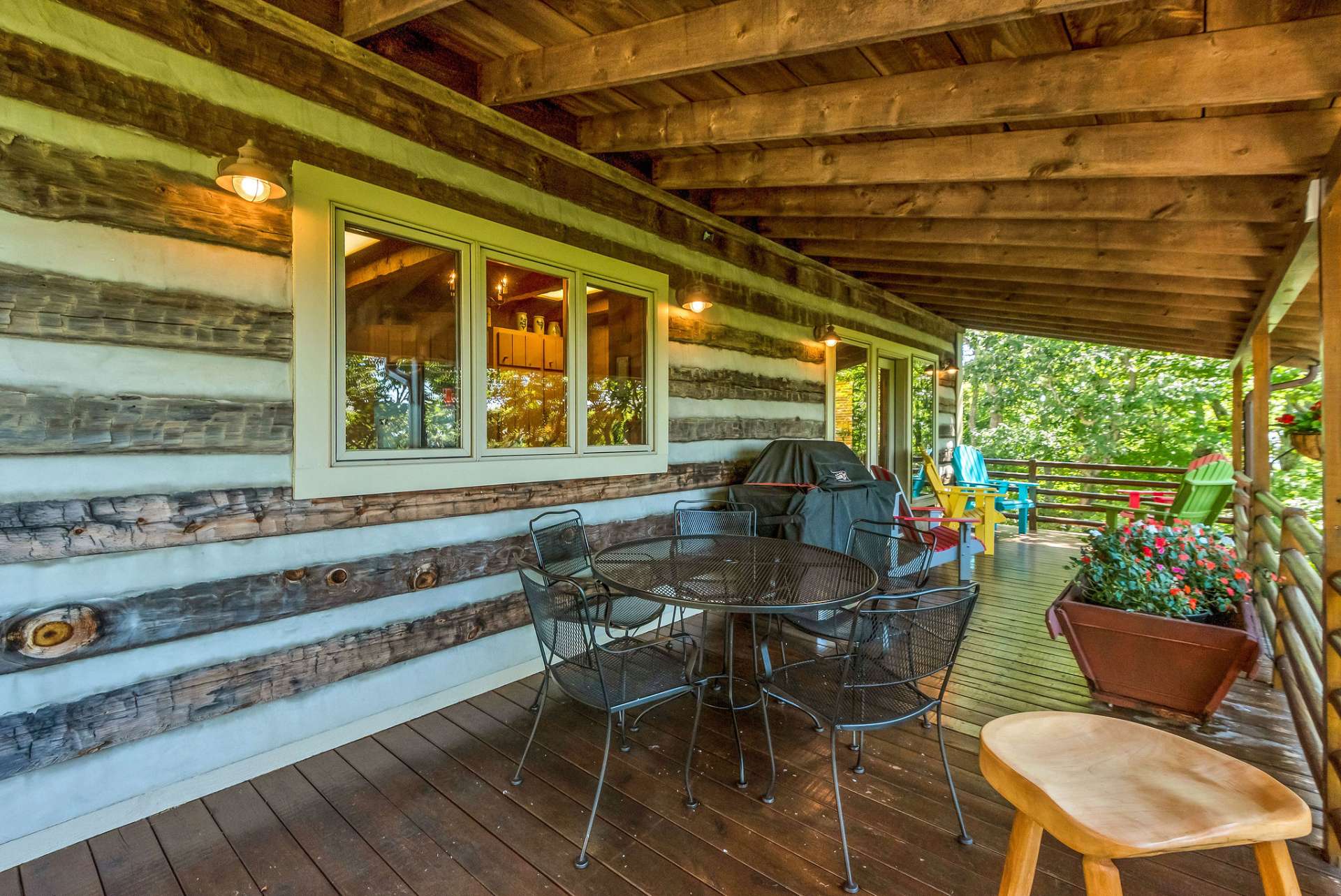 Dine al fresco or invite neighbors over for wine on the back covered deck. This space is perfect for any occasion, rain or shine.