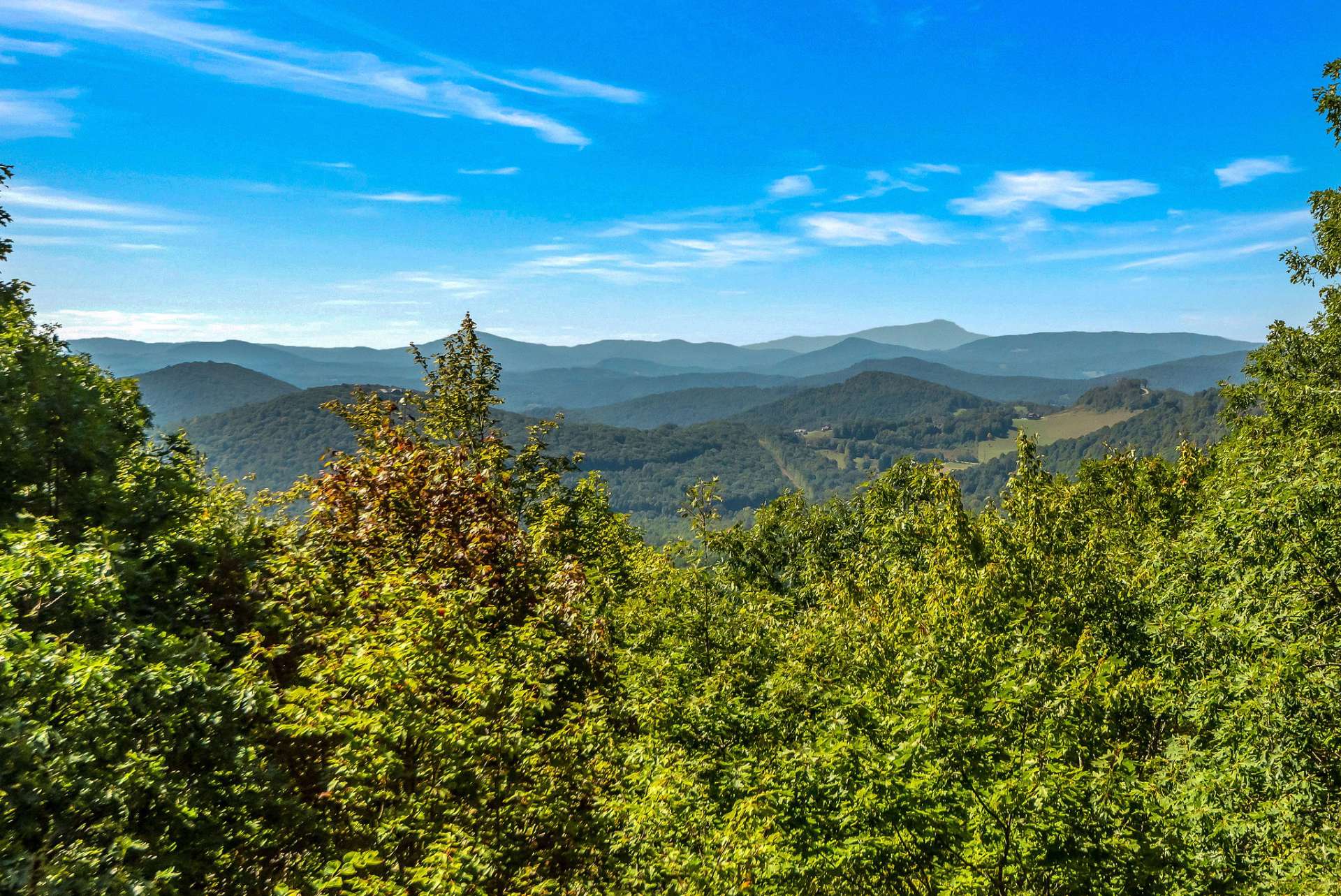 There's nothing quite like the breathtaking sight of a sea of mountain tops, stretching endlessly across the horizon and filling your view with natural beauty.