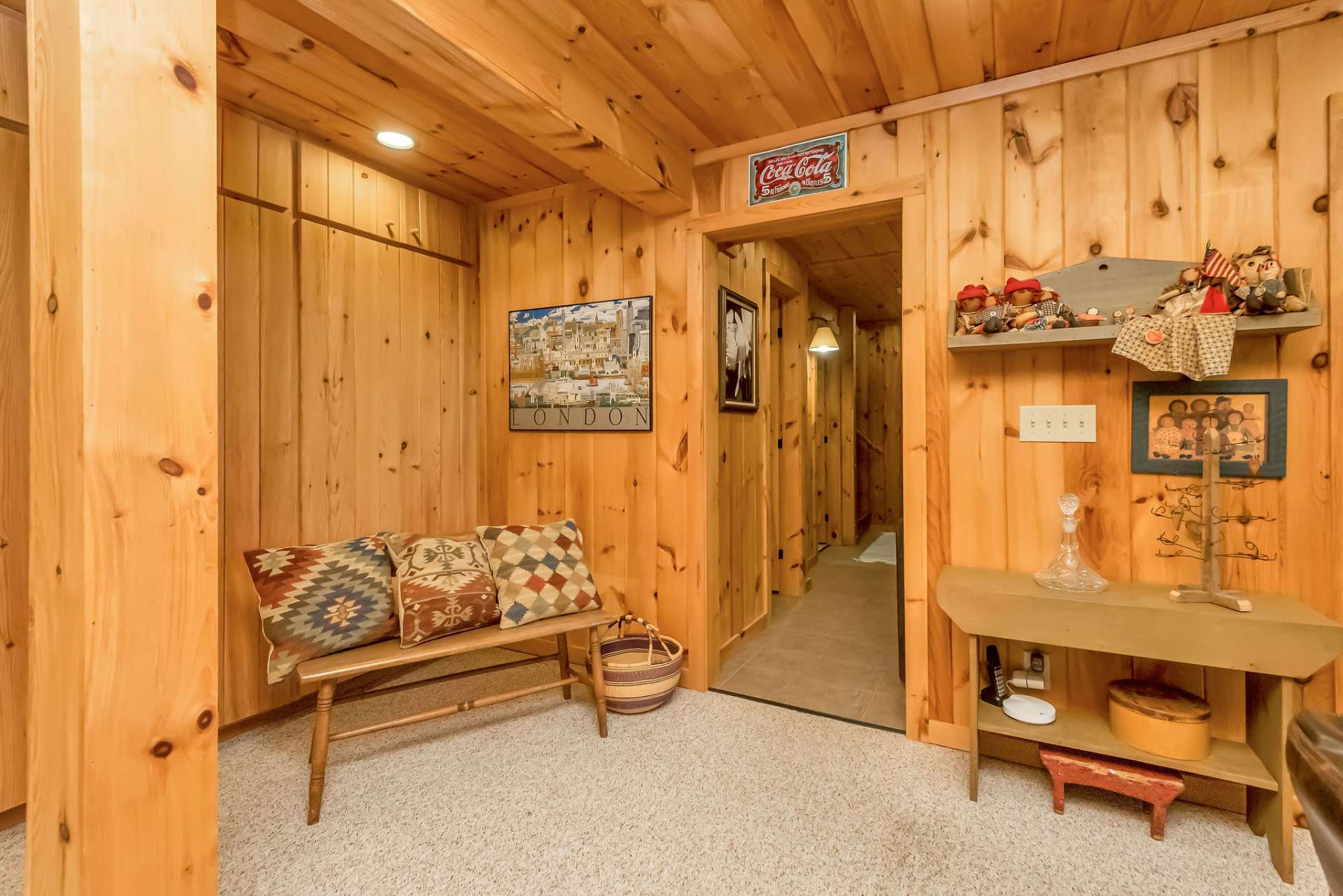 The lower level's hallway leads you to easy access to garage, more closets, a full bath and family room.