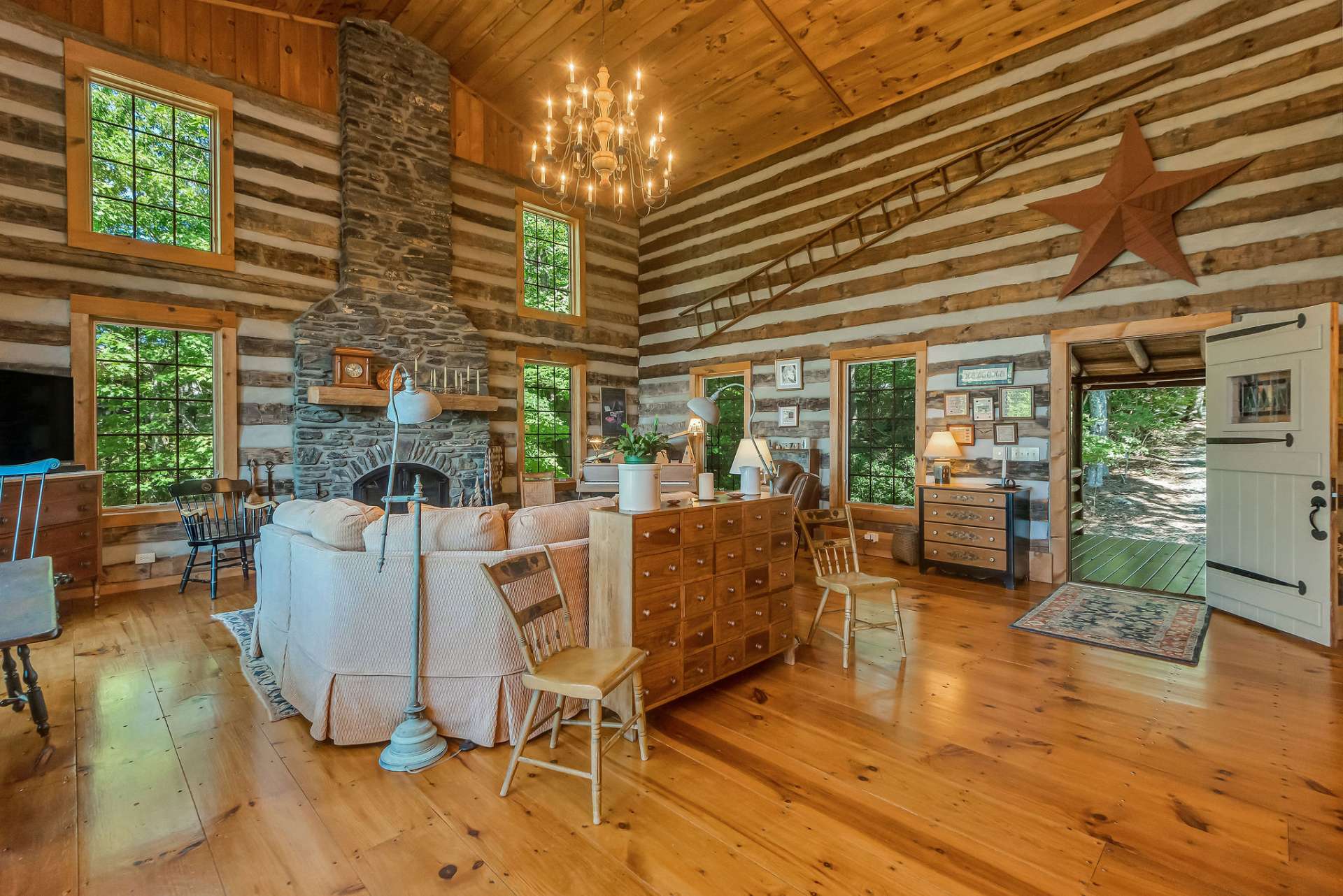 The builder used extra logs to enhance the cabin's height and designed additional width, resulting in a more open and impressive living area.