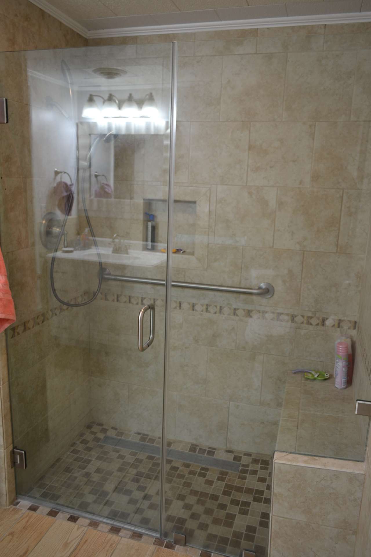 Newly upgraded tiled walk-in shower.