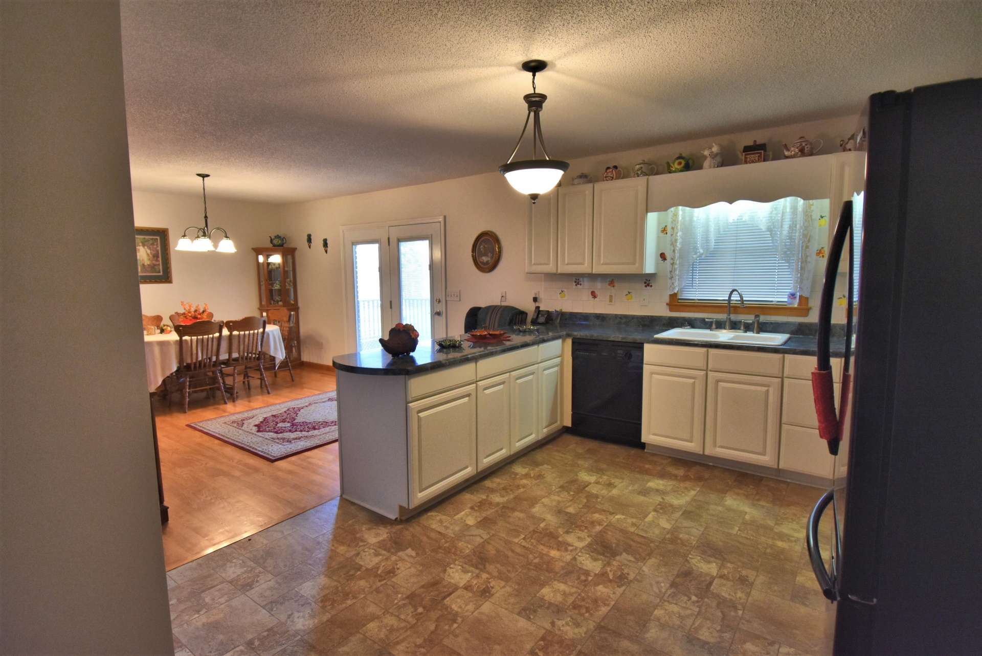 The kitchen is open to the dining area for convenience when entertaining family and friends.