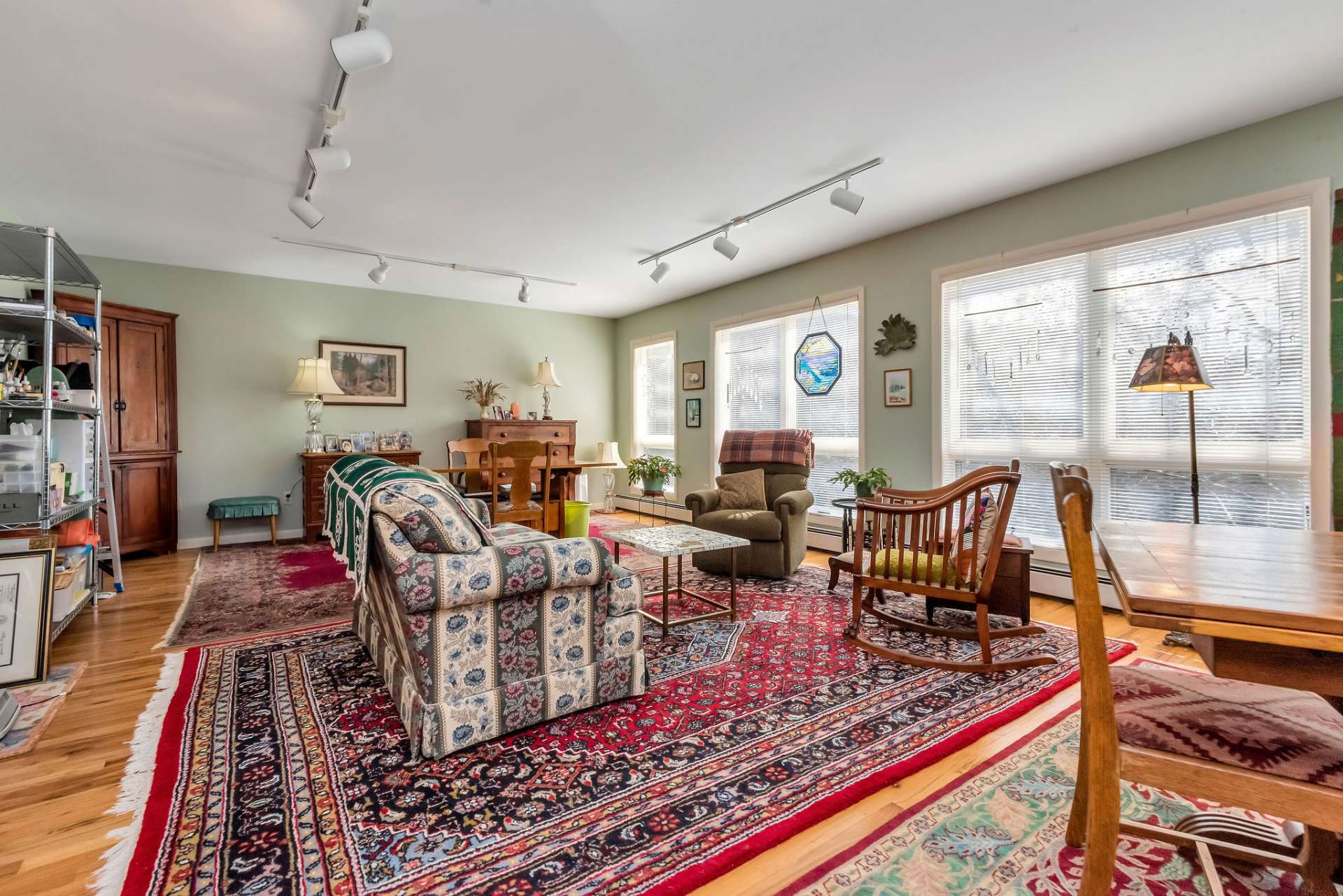 This spacious light filled bonus room on the upper level serves many options.