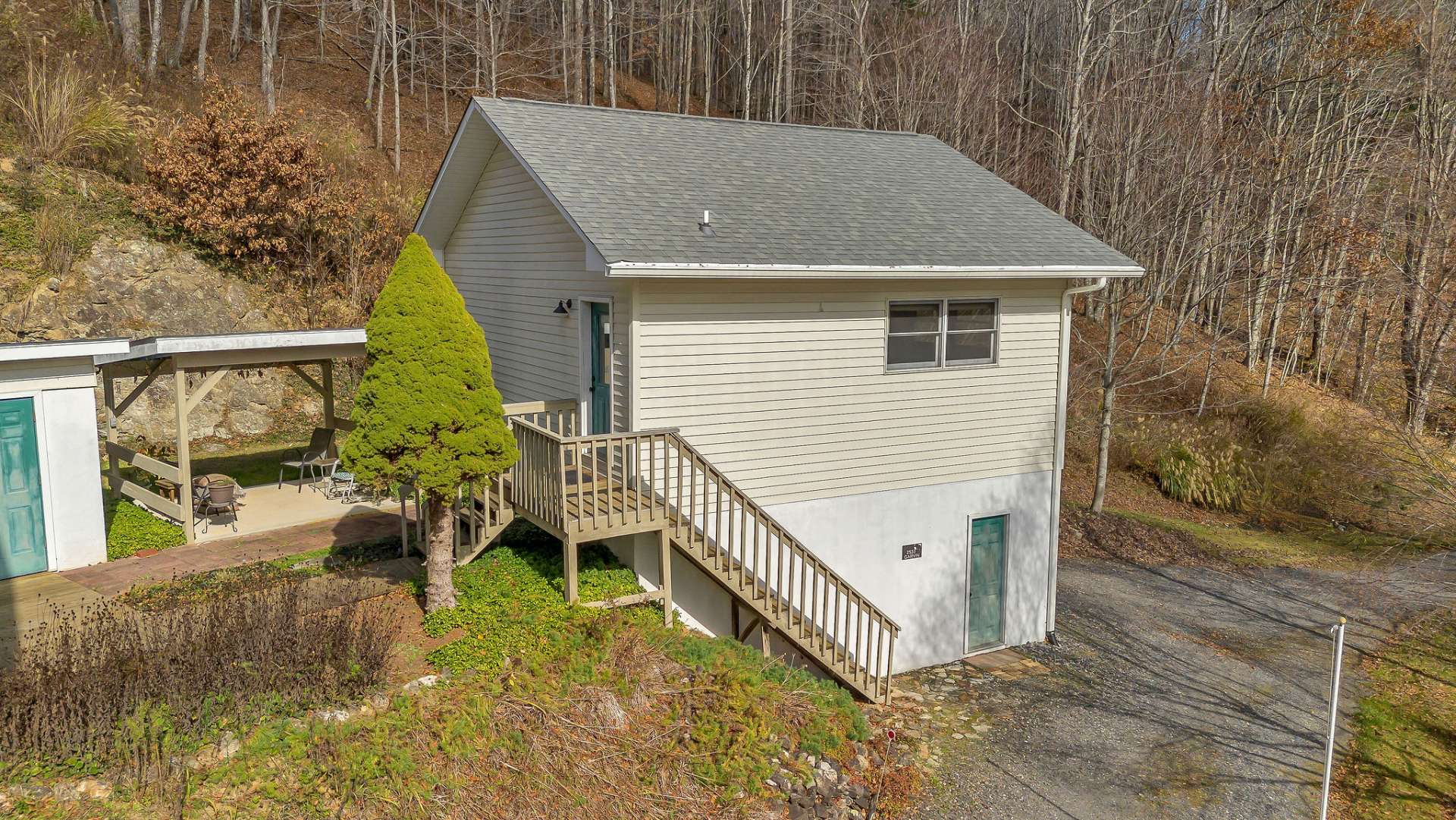 The heated garage is partially plumbed with a utility sink.