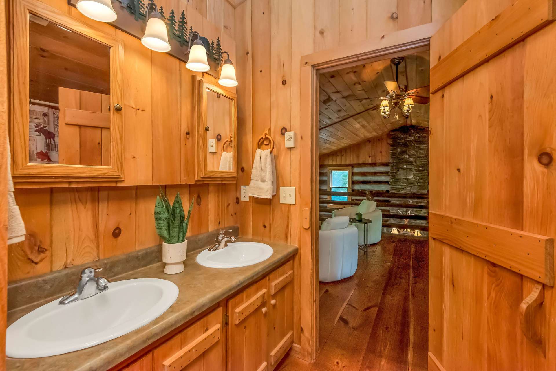 The upper-level full bath features a Jack-and-Jill design, providing access from both the bedroom and the loft. Both bathrooms in this home are equipped with double sinks, offering added convenience and luxury....