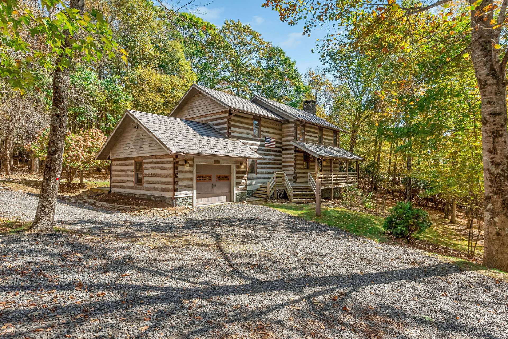 This enchanting antique log home is a perfect blend of rustic charm and modern comfort.