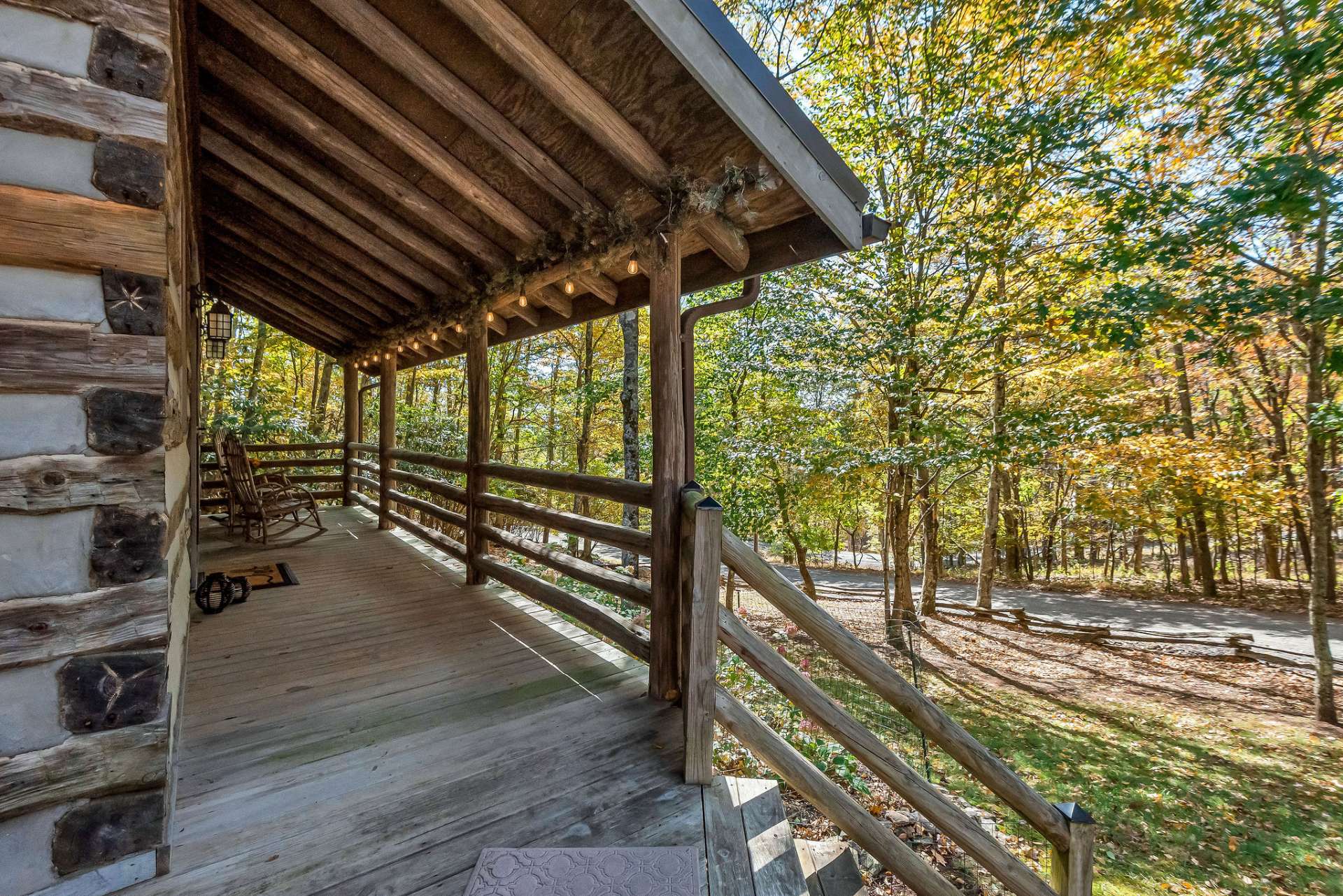 Relax on the front porch and greet neighbors as they pass by.