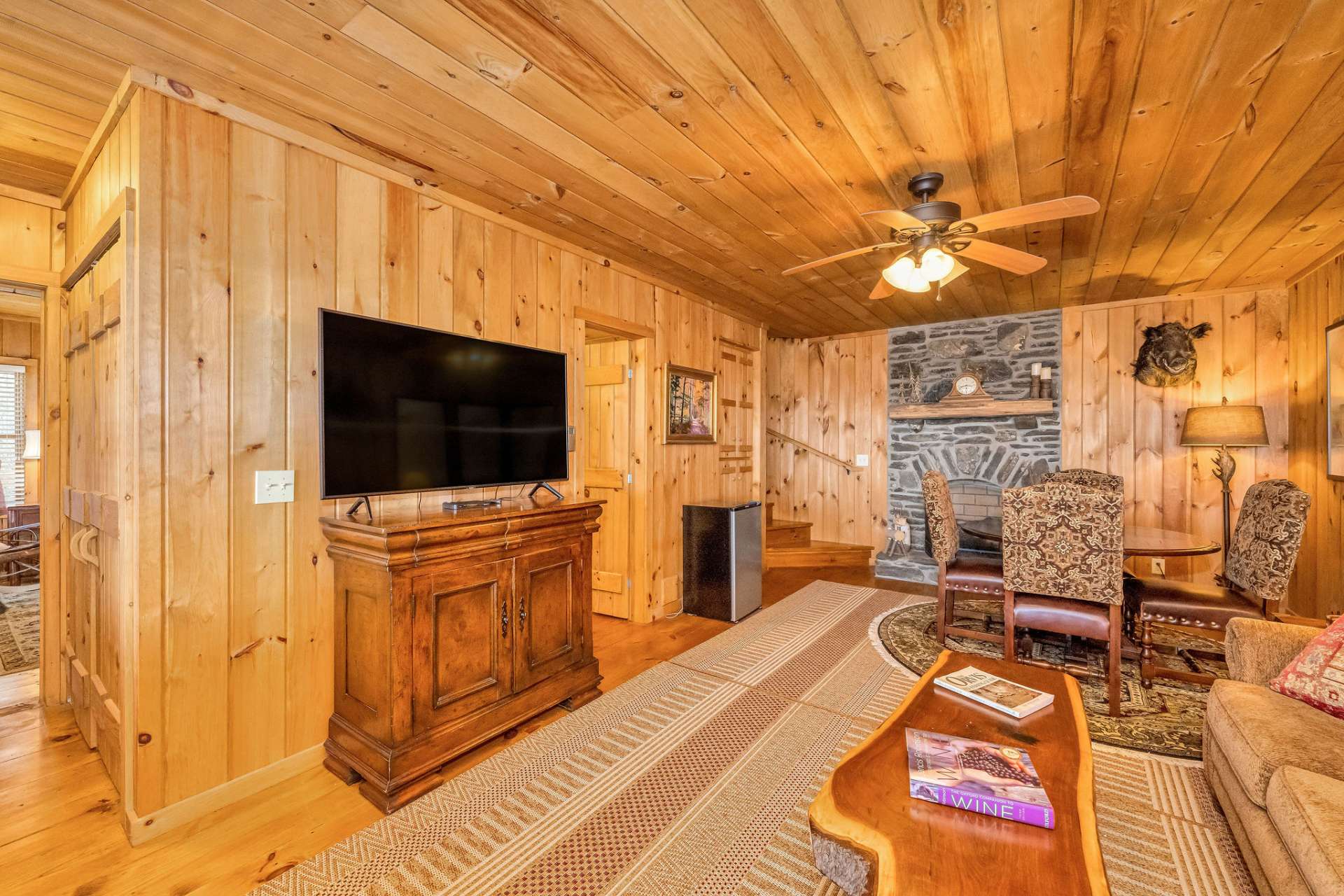 The laundry is located in the hallway leading to the lower level guest bedroom.