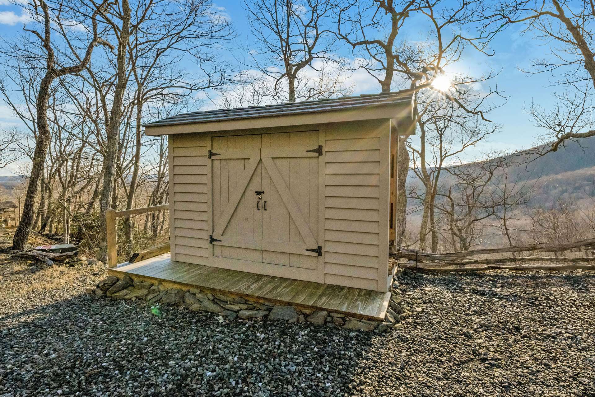 Expertly designed storage/wood shed with space to stack wood on both ends.